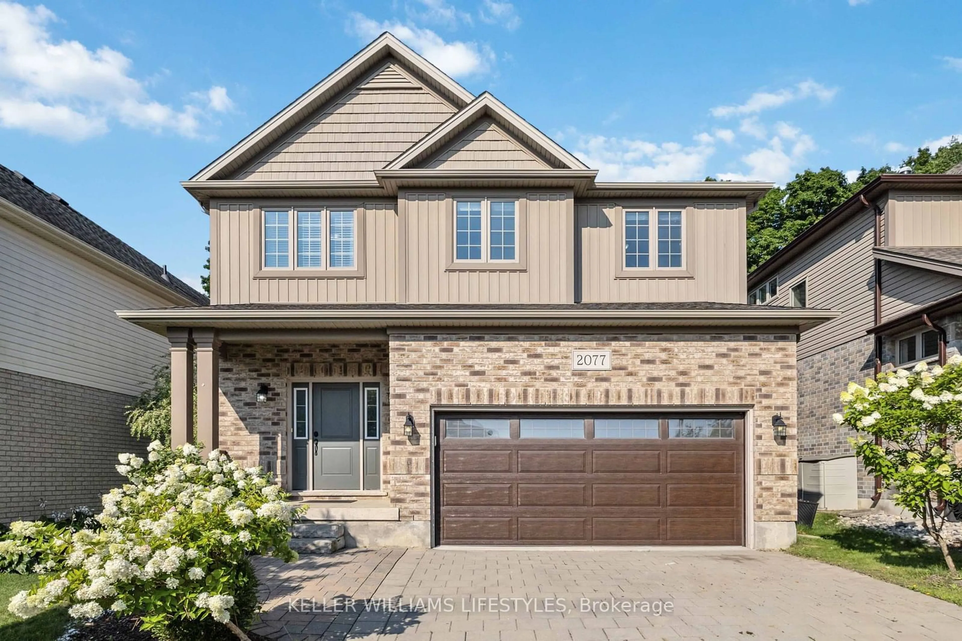 Home with brick exterior material for 2077 SPRINGRIDGE Dr, London Ontario N5X 0H3