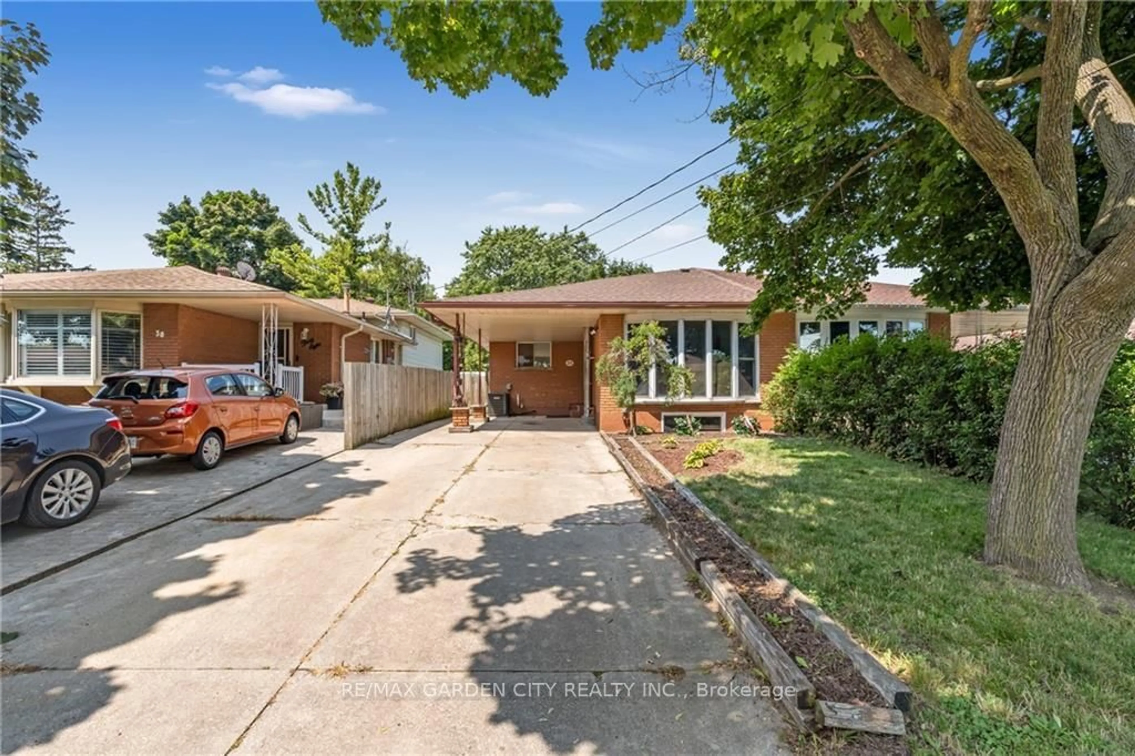 Frontside or backside of a home, the street view for 34 Rita Ave, Hamilton Ontario L8W 1M5