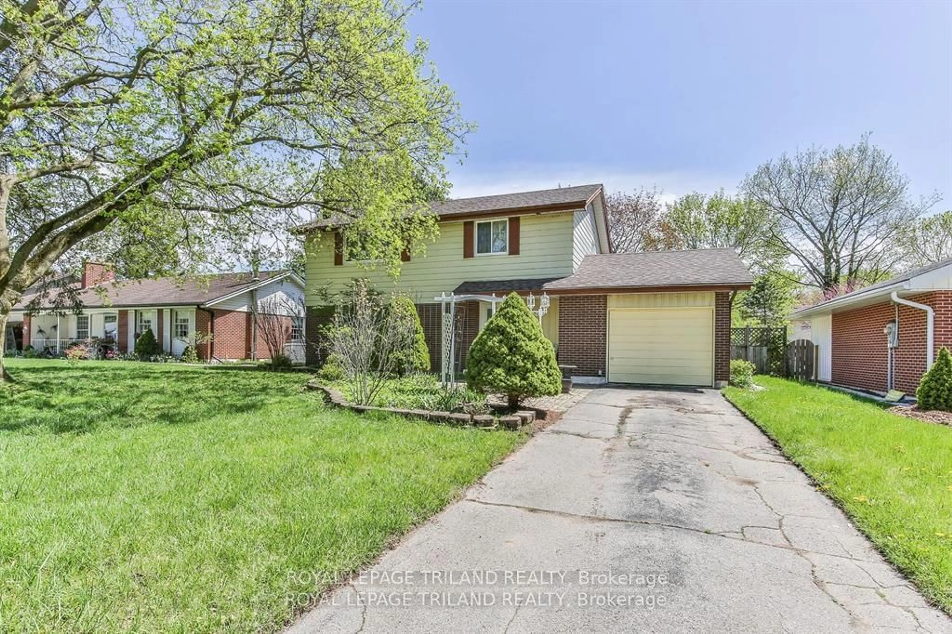 Frontside or backside of a home for 14 MONTCLAIR Ave, London Ontario N6H 3V1