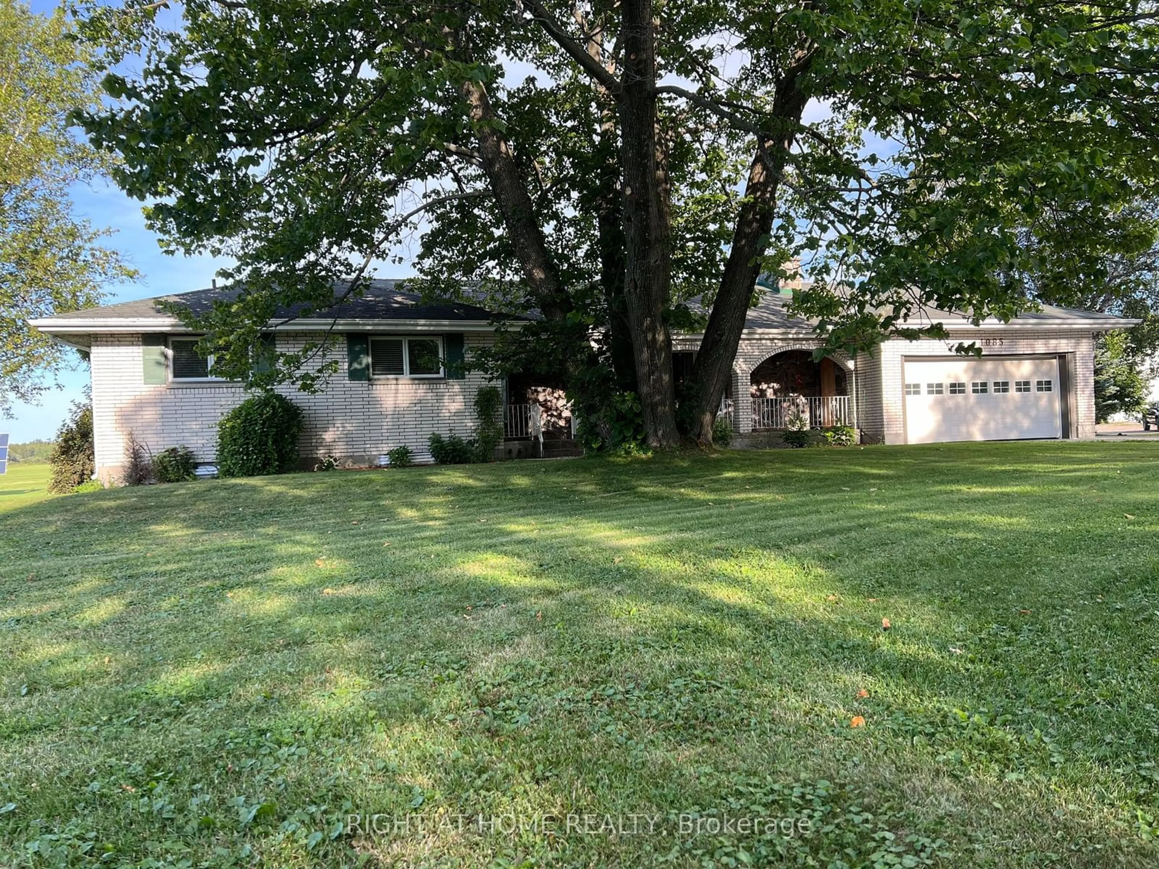 Frontside or backside of a home, the fenced backyard for 12061 Hwy 64 North, West Nipissing Ontario P2B 2L8