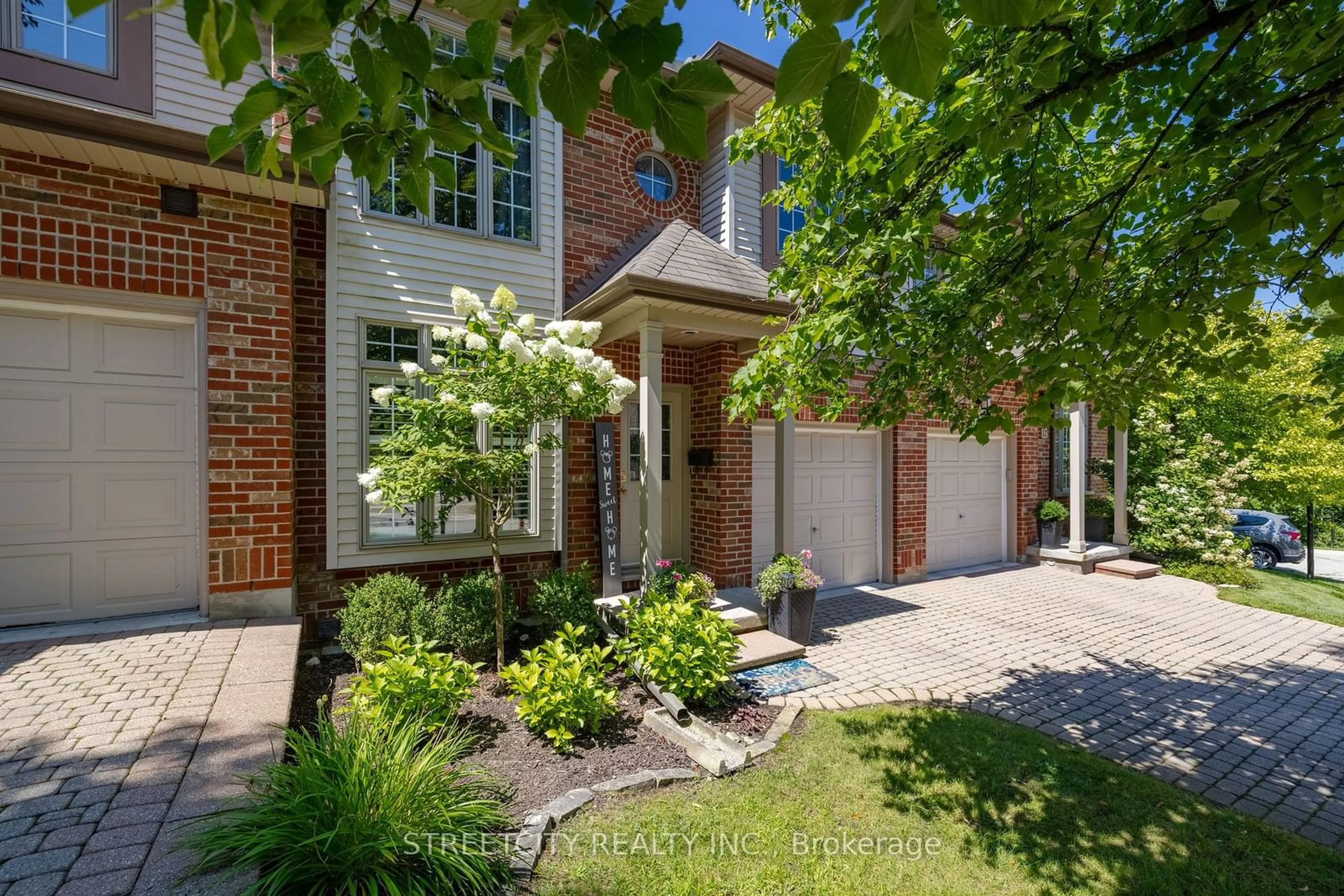 Home with brick exterior material for 499 Teeple Terr #13, London Ontario N6J 1T1