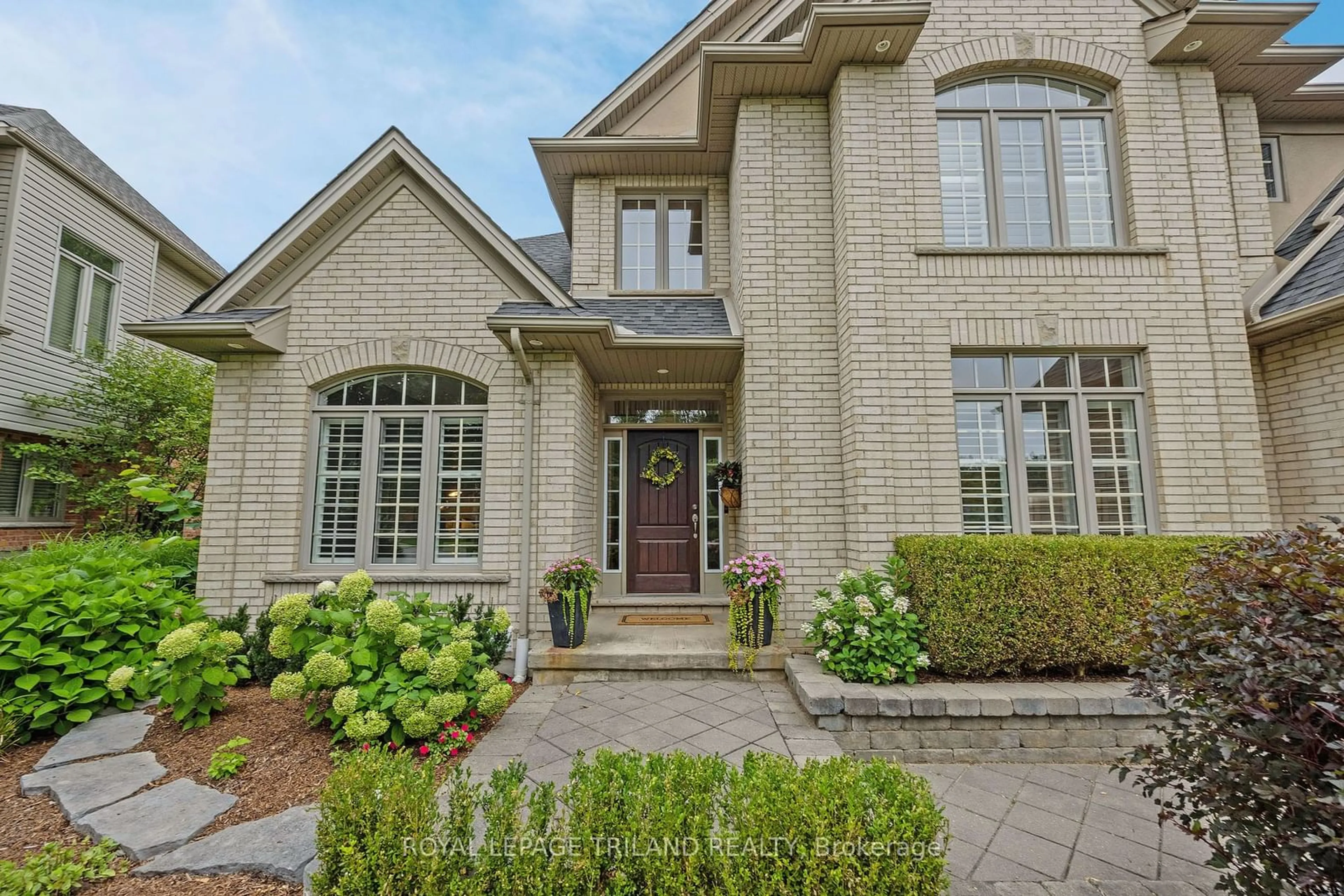 Home with brick exterior material for 1411 Shore Rd, London Ontario N6K 4Z8