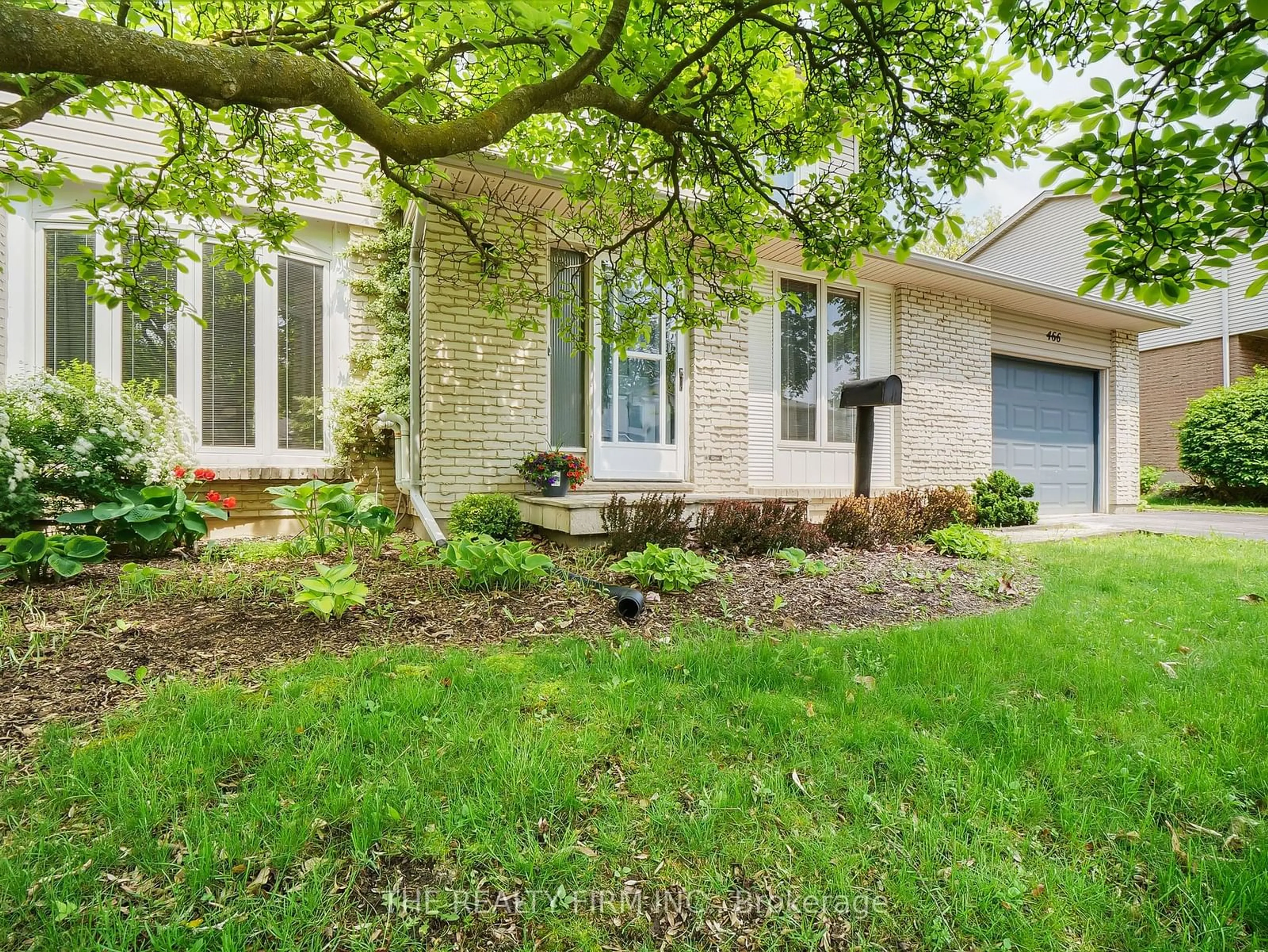 Frontside or backside of a home for 466 Village Green Ave, London Ontario N6J 1Y9