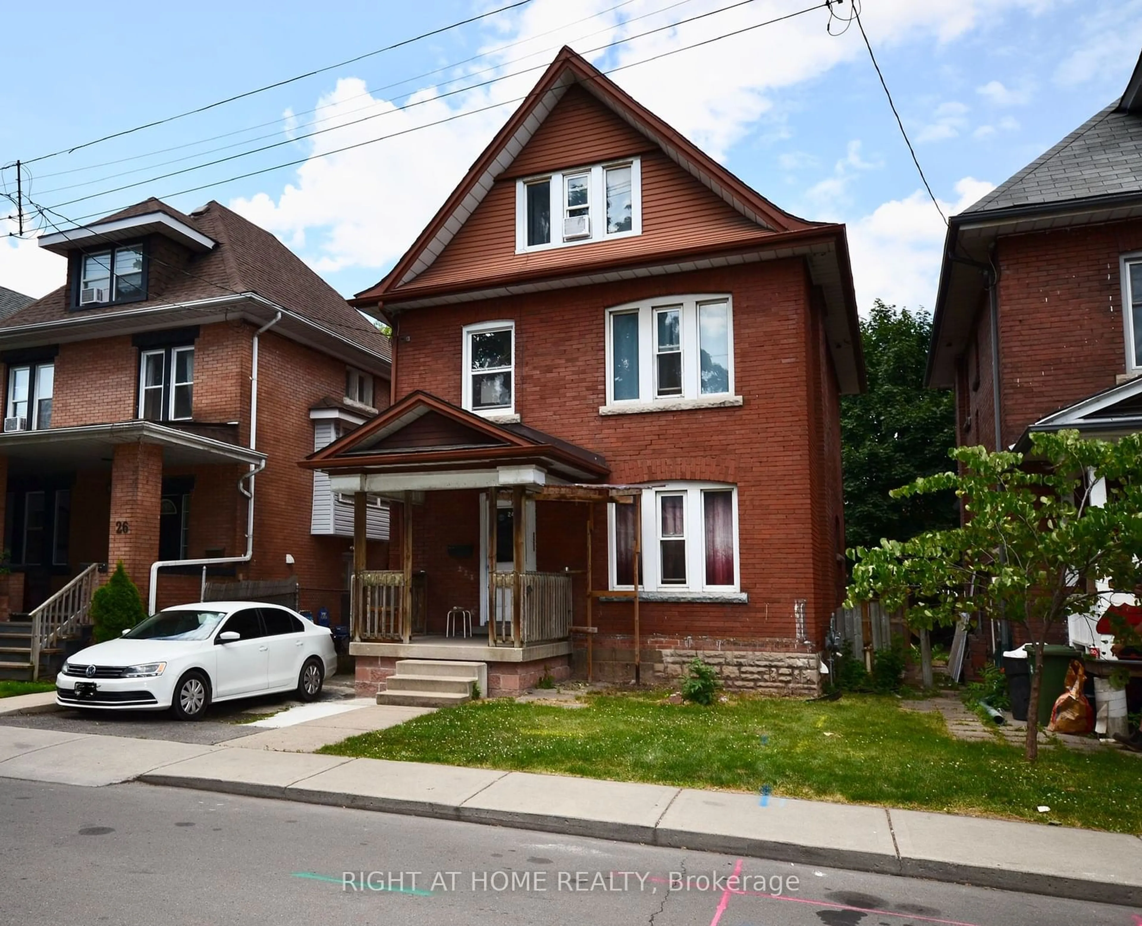 Frontside or backside of a home for 24 Spadina Ave, Hamilton Ontario L8M 2W9