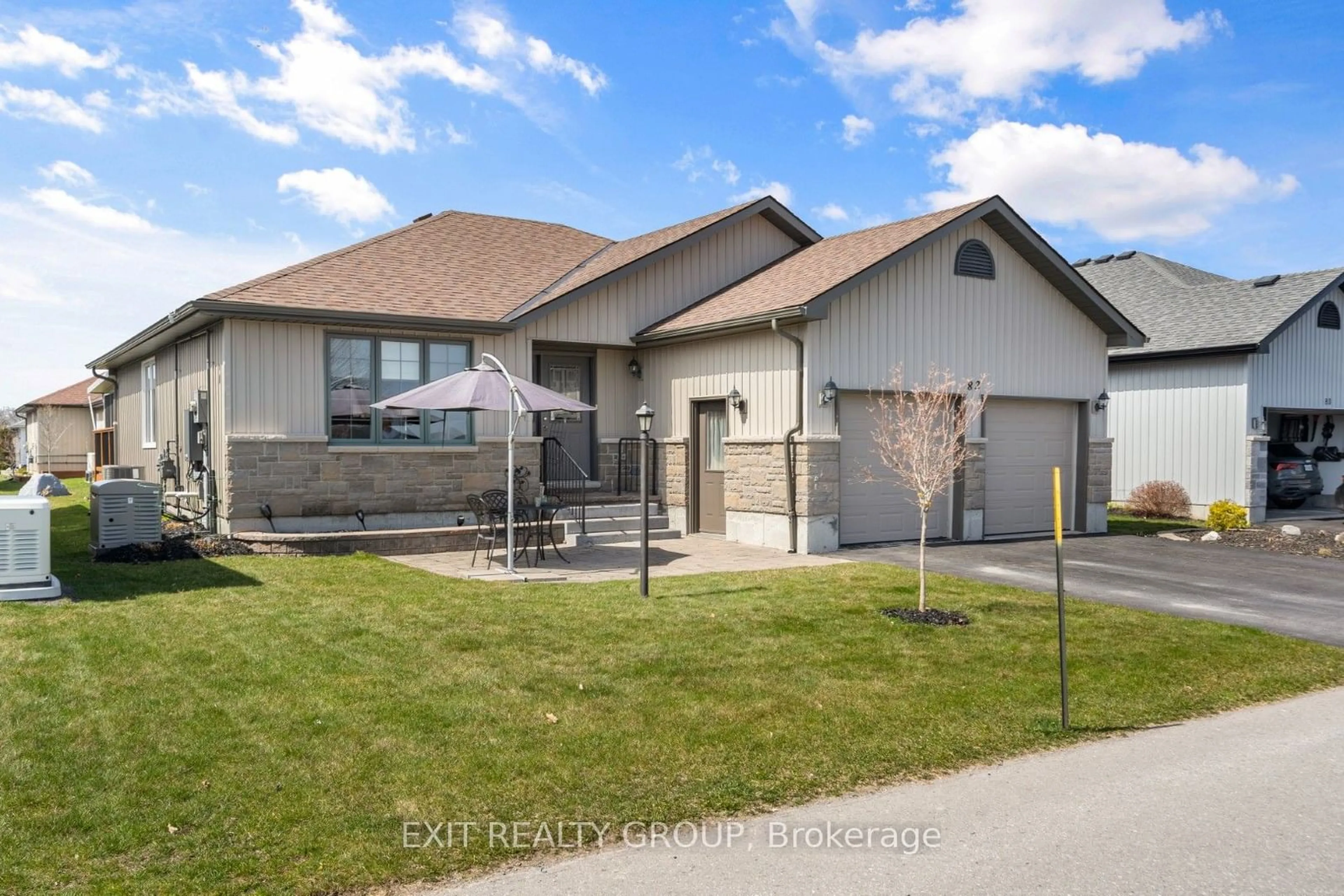 Frontside or backside of a home for 82 Dorchester Dr, Prince Edward County Ontario K0K 3L0