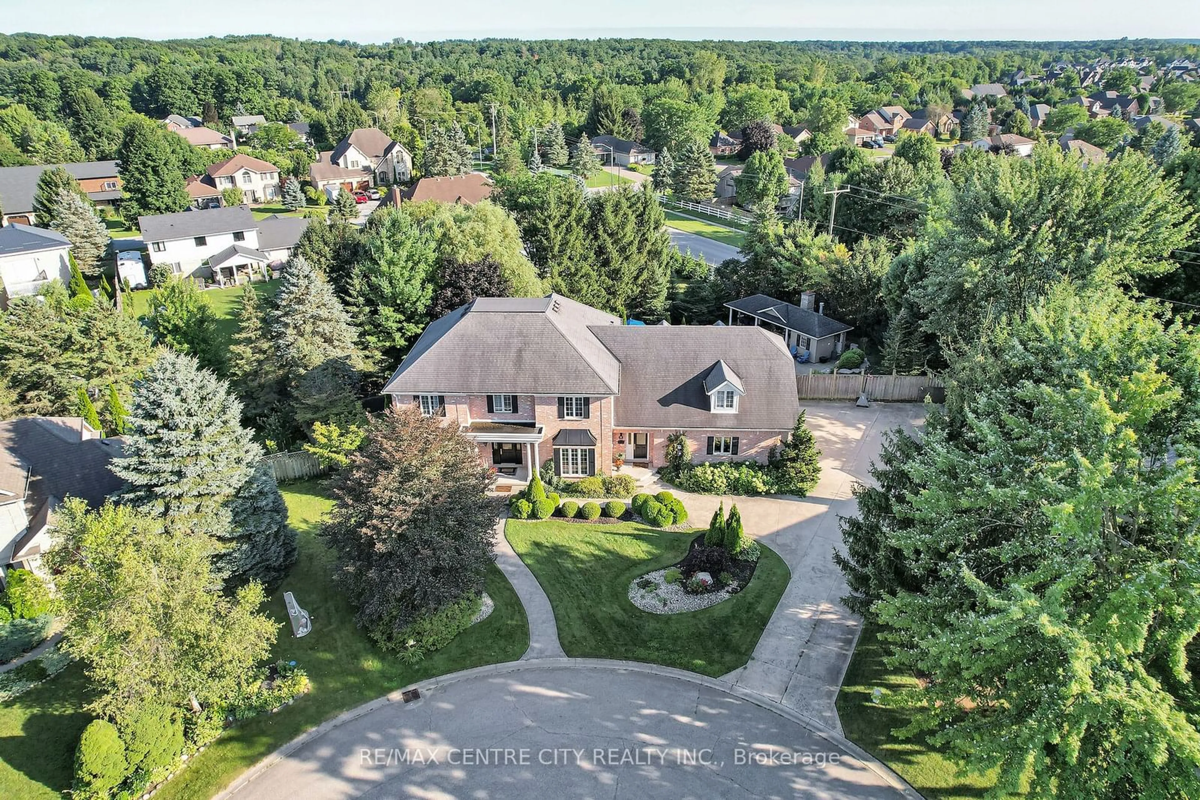 Frontside or backside of a home, the street view for 11 Woodland Dr, Middlesex Centre Ontario N0L 1R0