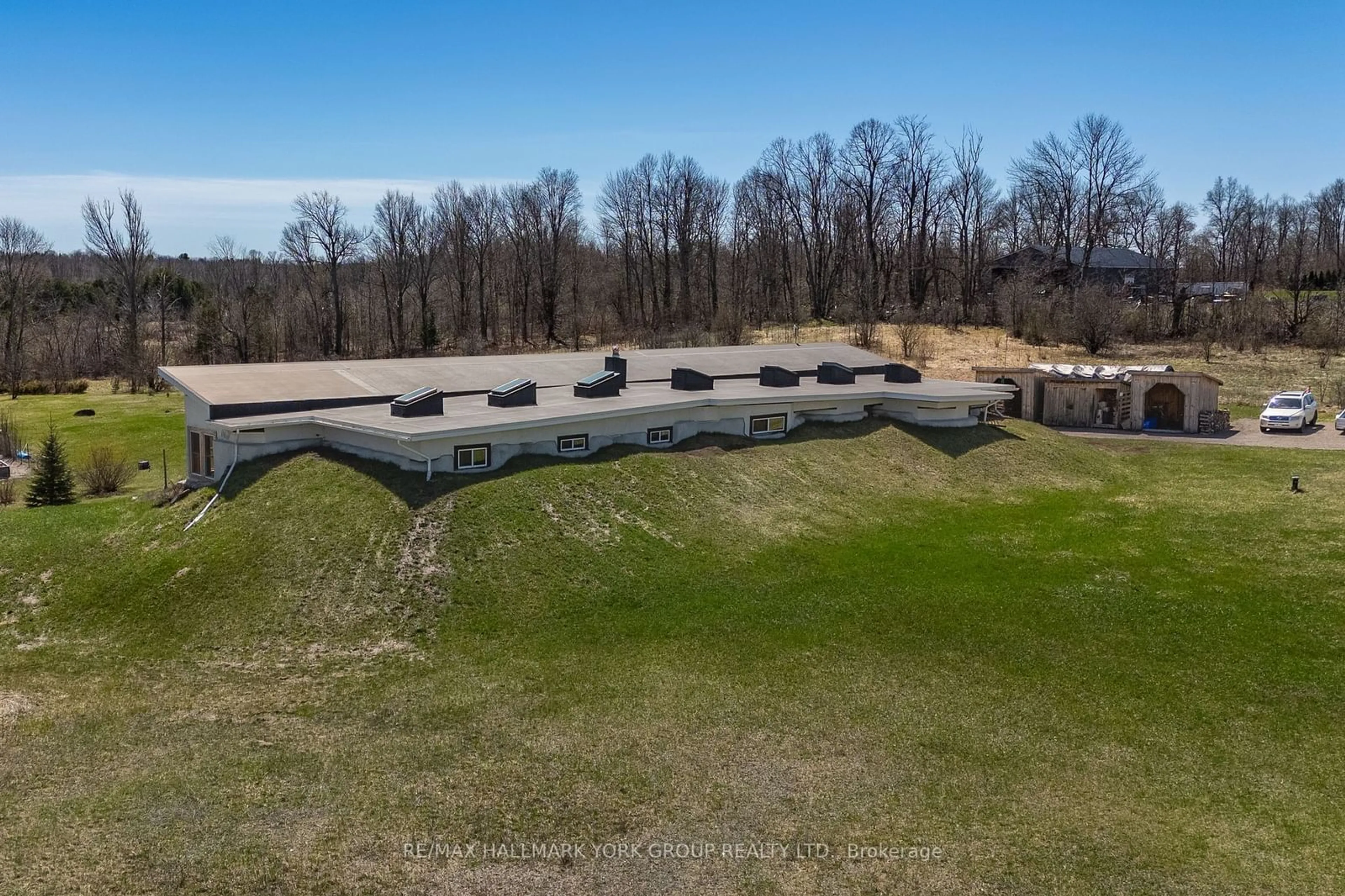 Frontside or backside of a home, the fenced backyard for 1375 Queensborough Rd, Madoc Ontario K0K 2K0