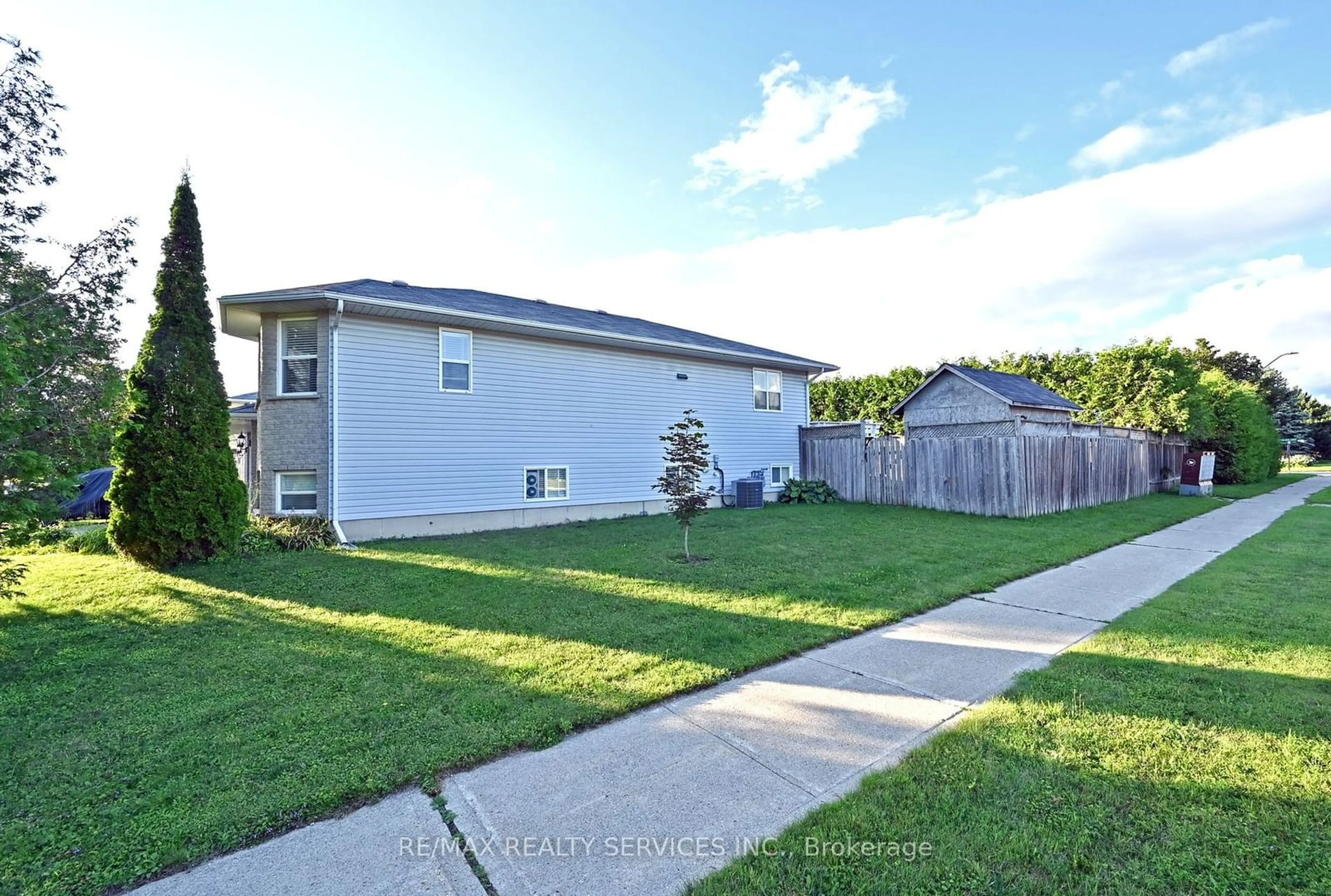 Frontside or backside of a home, the fenced backyard for 3 Wilson Cres, Southgate Ontario N0C 1B0