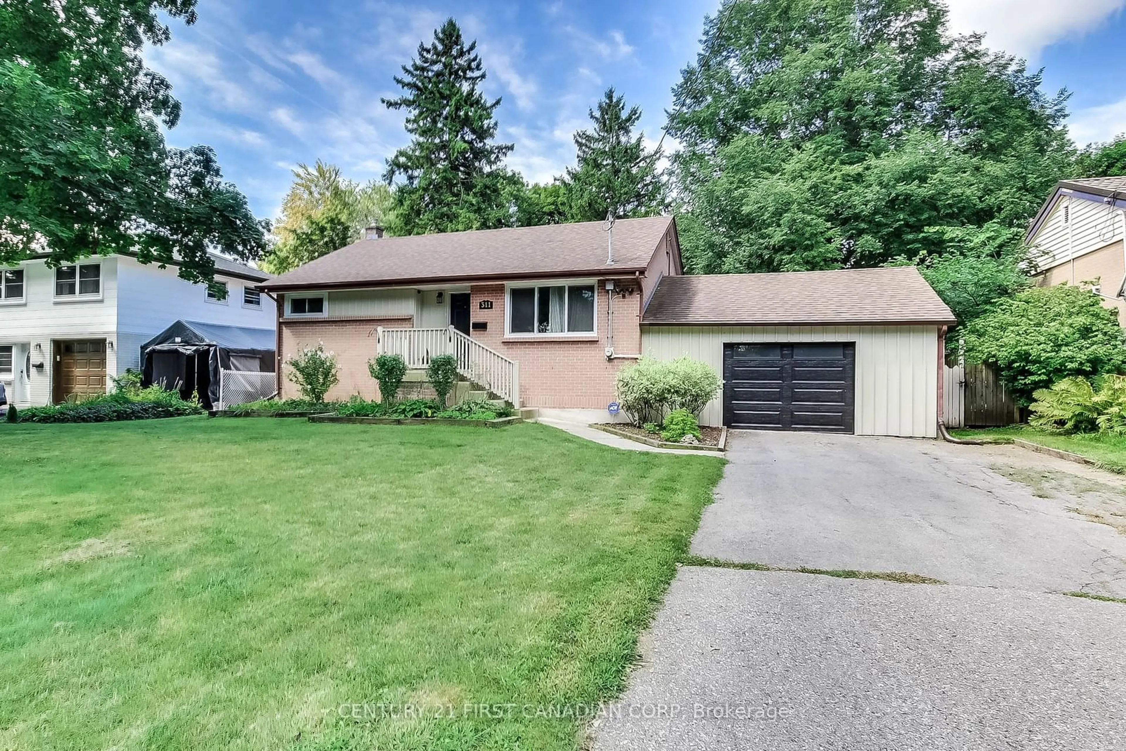 Frontside or backside of a home for 311 Wedgewood Dr, London Ontario N5Y 2G7