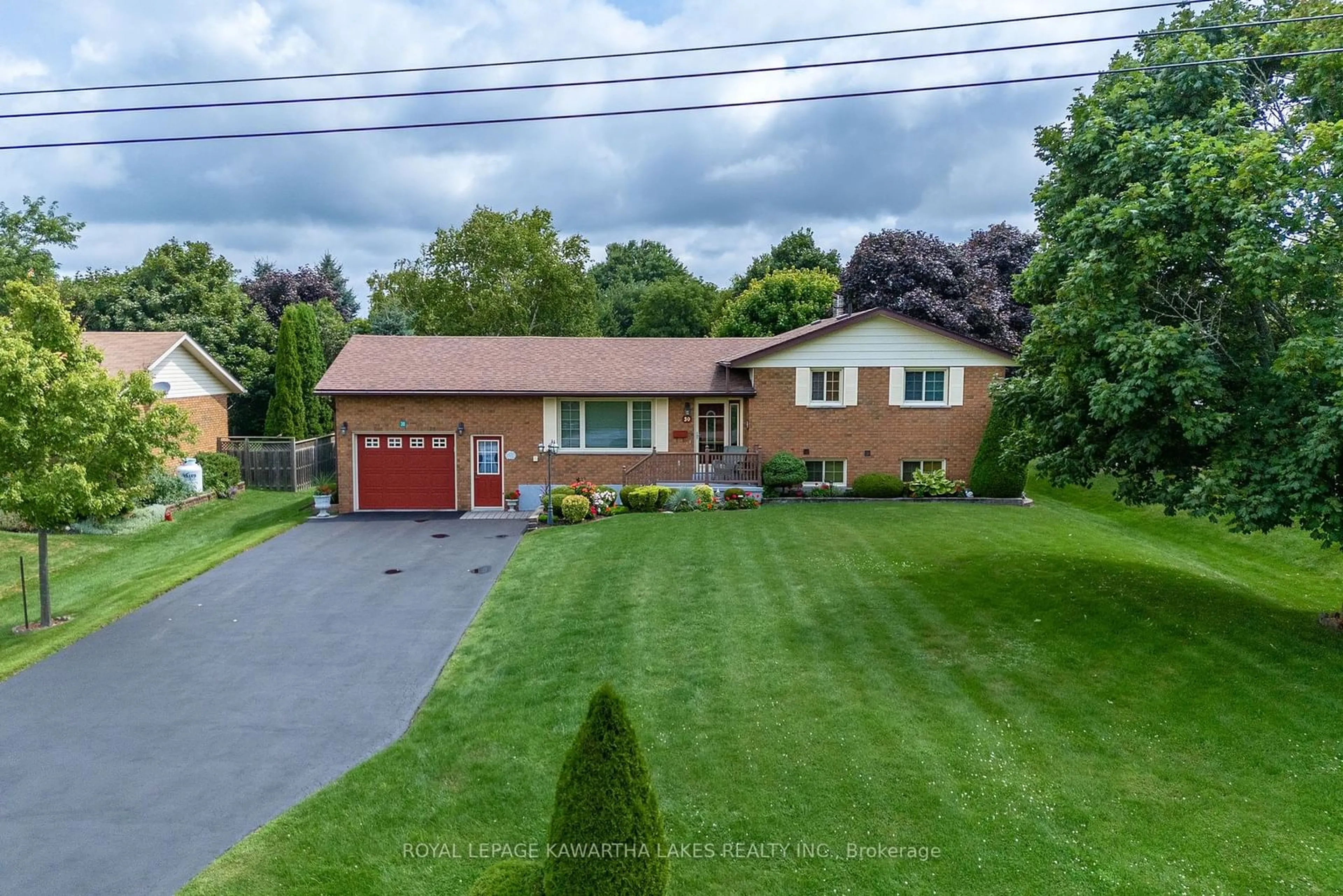 Frontside or backside of a home, the street view for 30 Grant Dr, Kawartha Lakes Ontario K0M 2M0