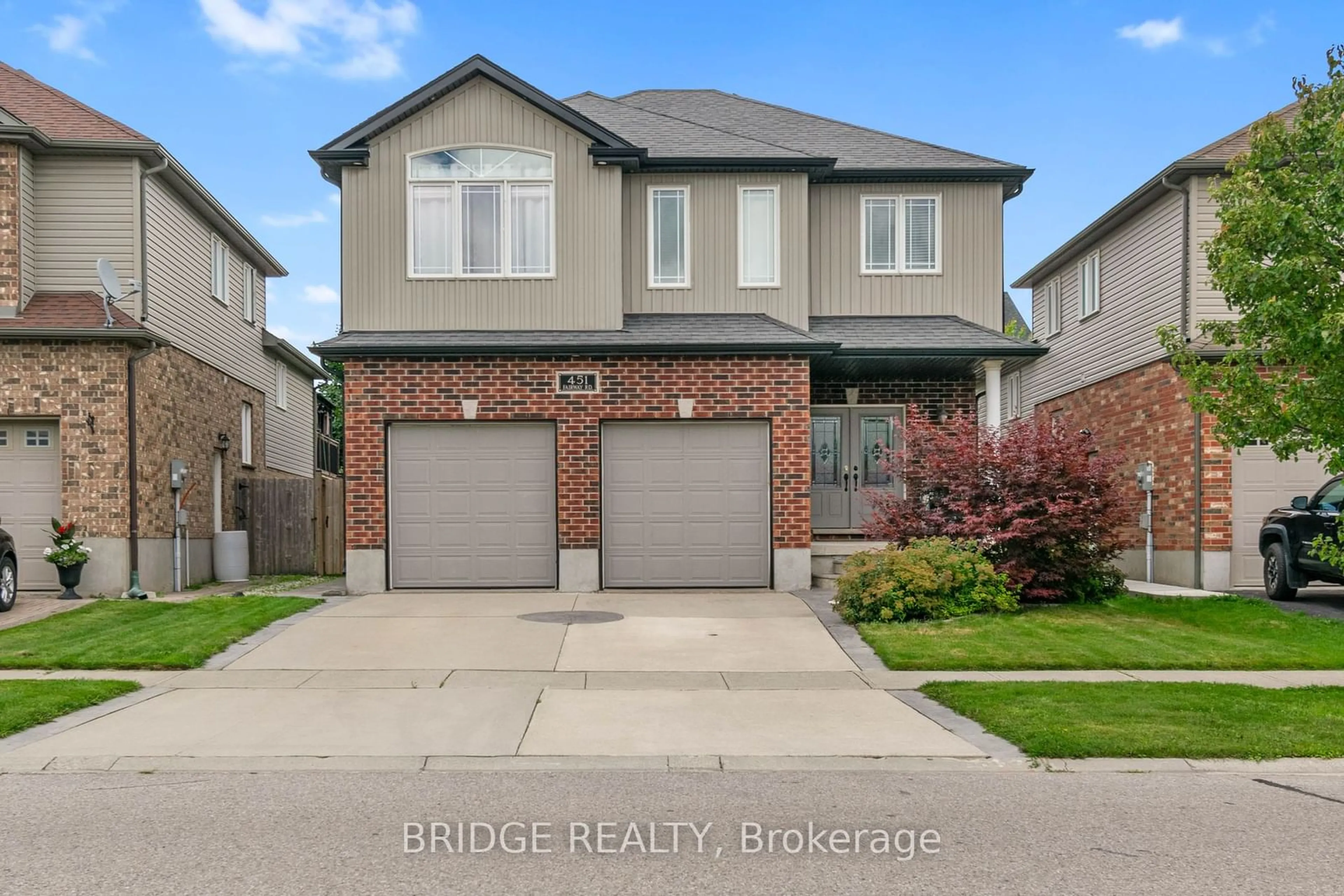 Frontside or backside of a home, the street view for 451 Fairway Rd, Woodstock Ontario N4T 0E1