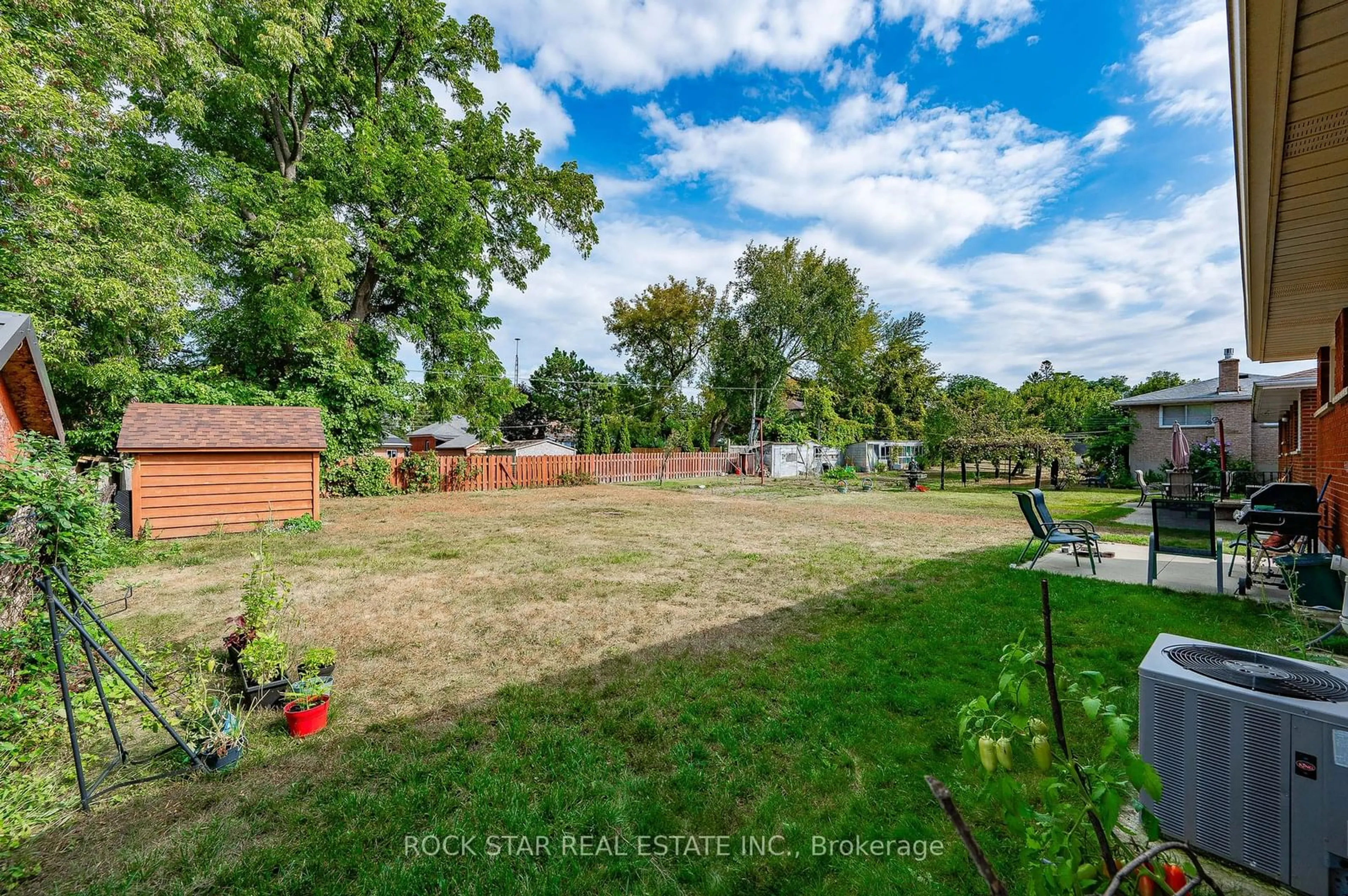 Patio, the fenced backyard for 236 Bruce St, Brantford Ontario N3S 4Z9