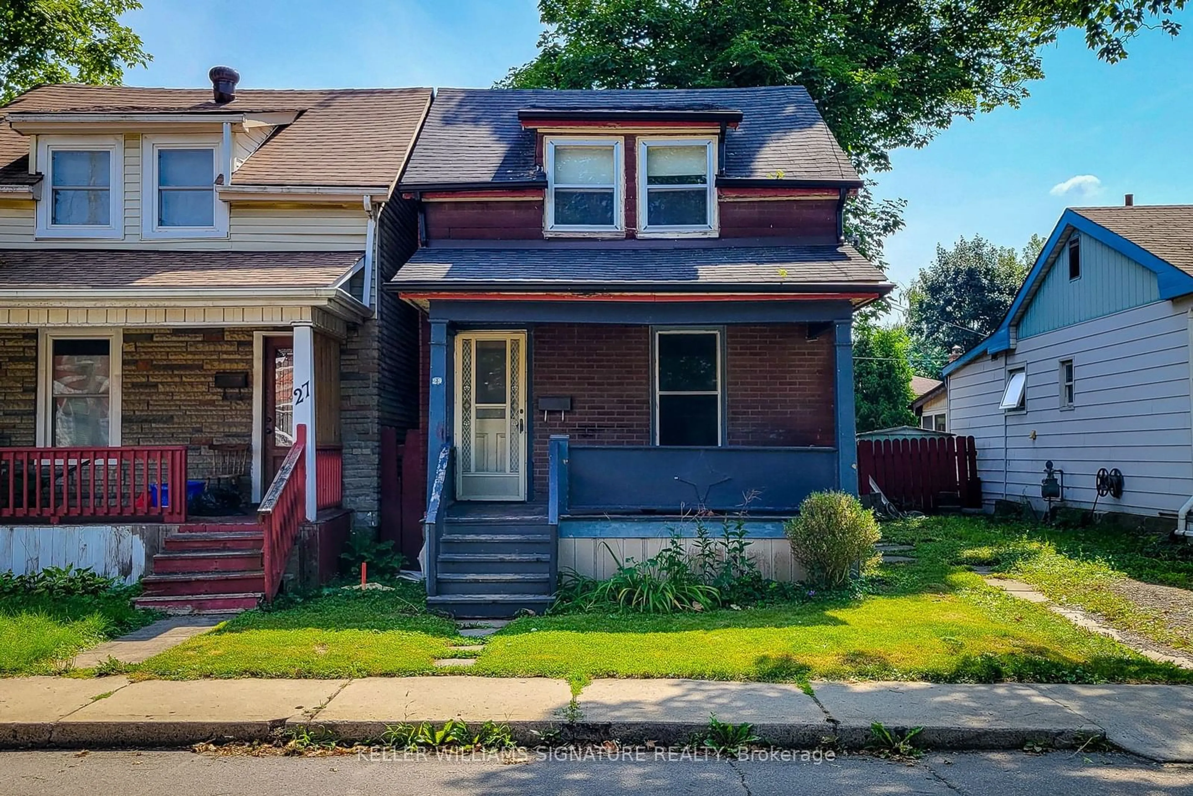 Frontside or backside of a home for 29 New St, Hamilton Ontario L8P 4J6