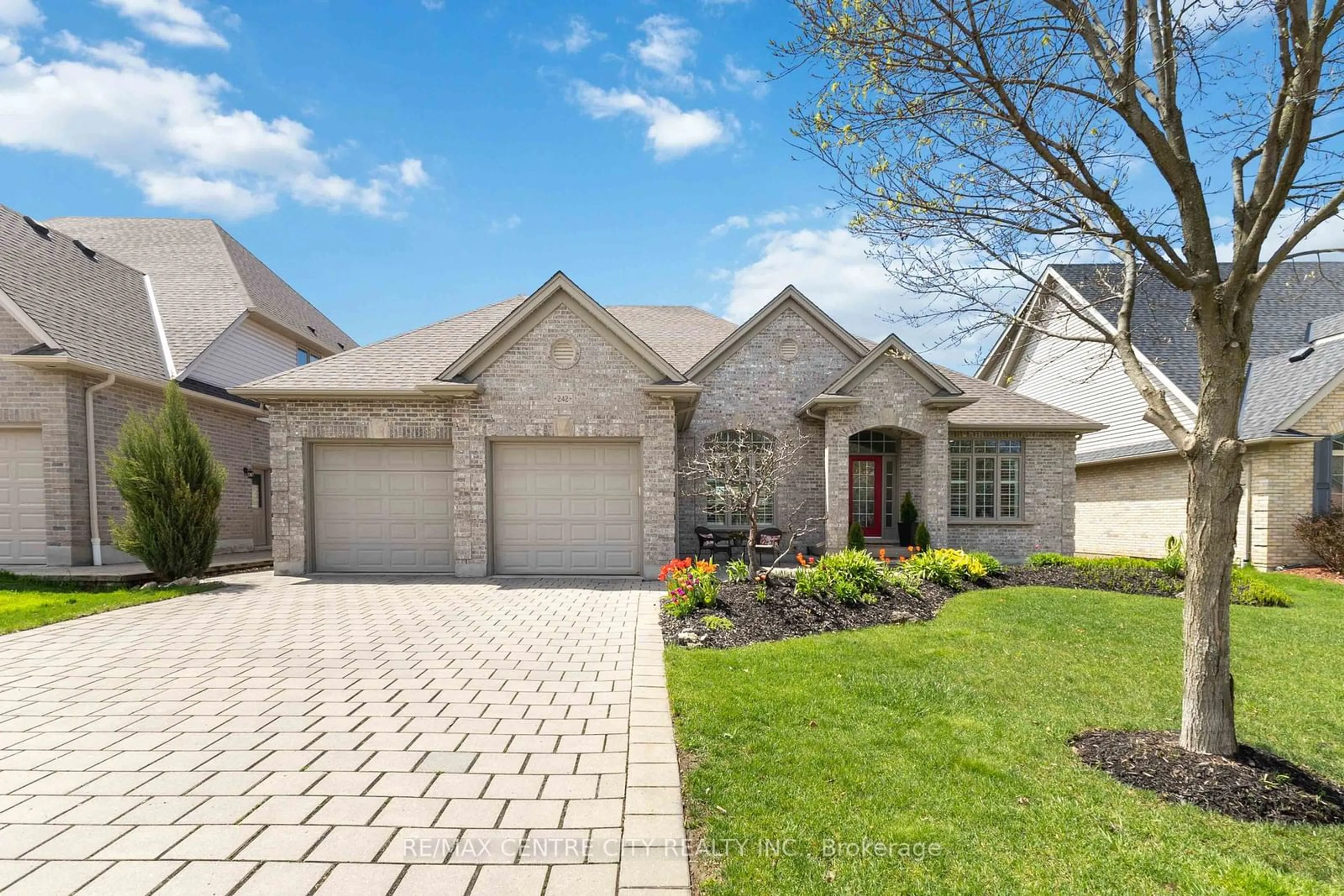 Home with brick exterior material for 242 East Rivertrace Walk, London Ontario N6G 5L1