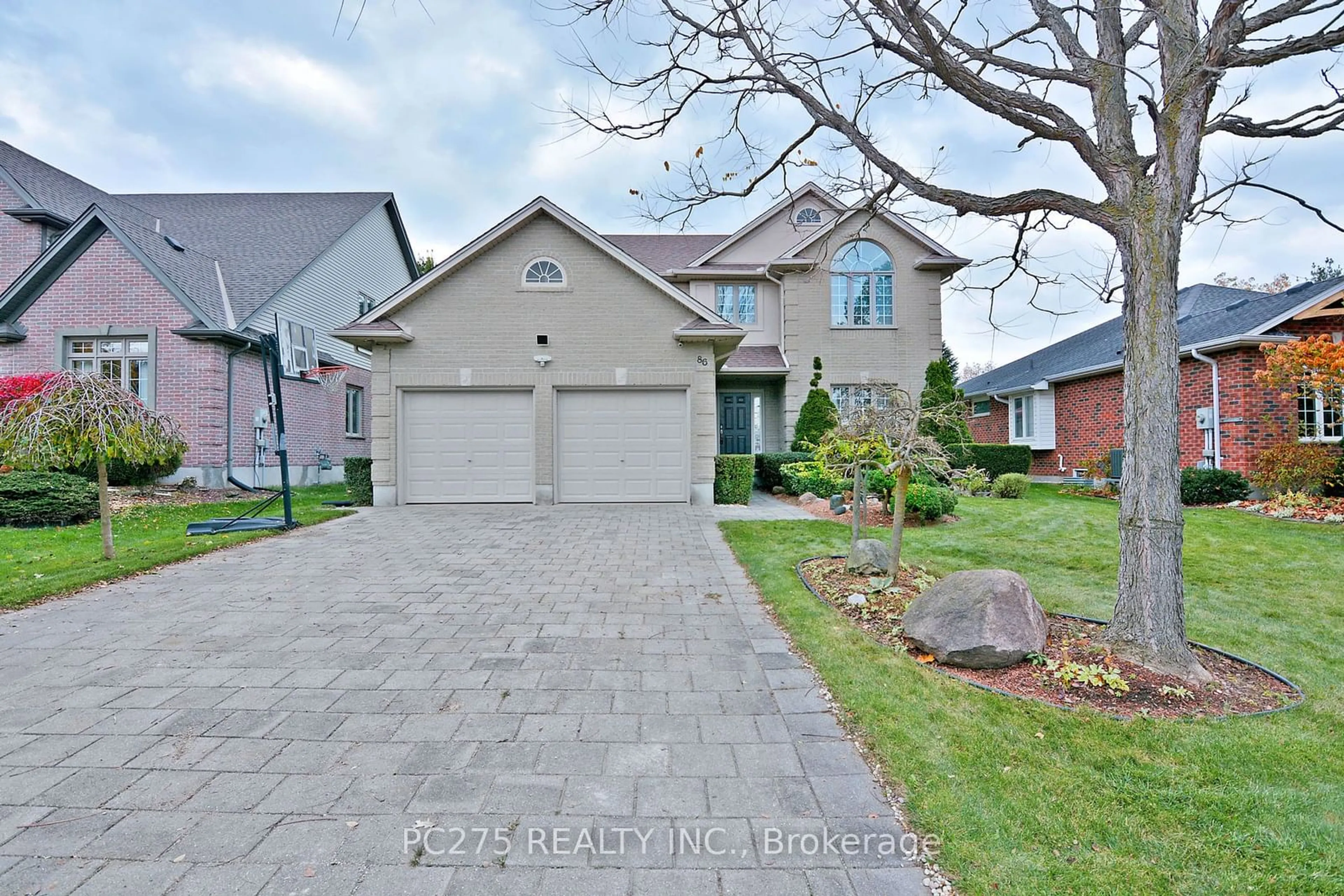 Home with brick exterior material for 86 Cheltenham Rd, London Ontario N6H 5P9