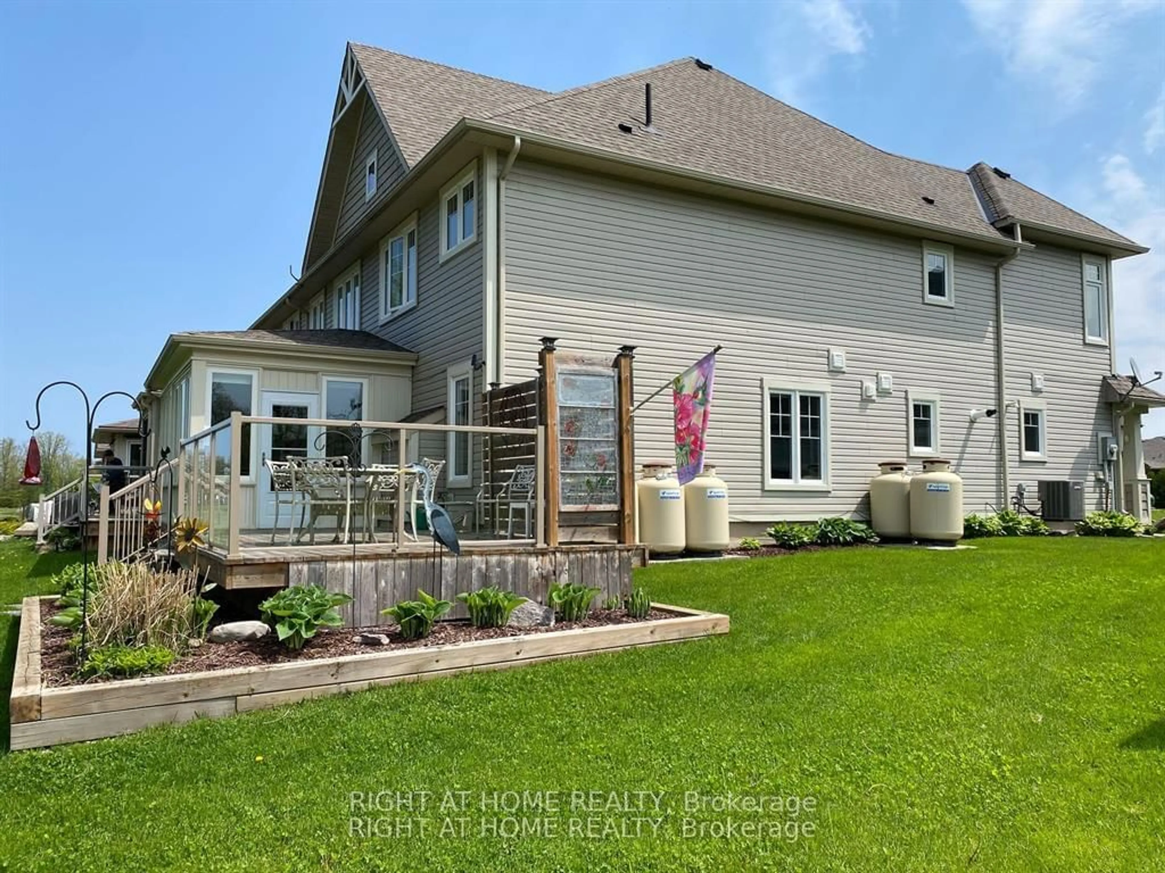 Frontside or backside of a home, the fenced backyard for 28 Masters Cres, Georgian Bay Ontario L0K 1S0