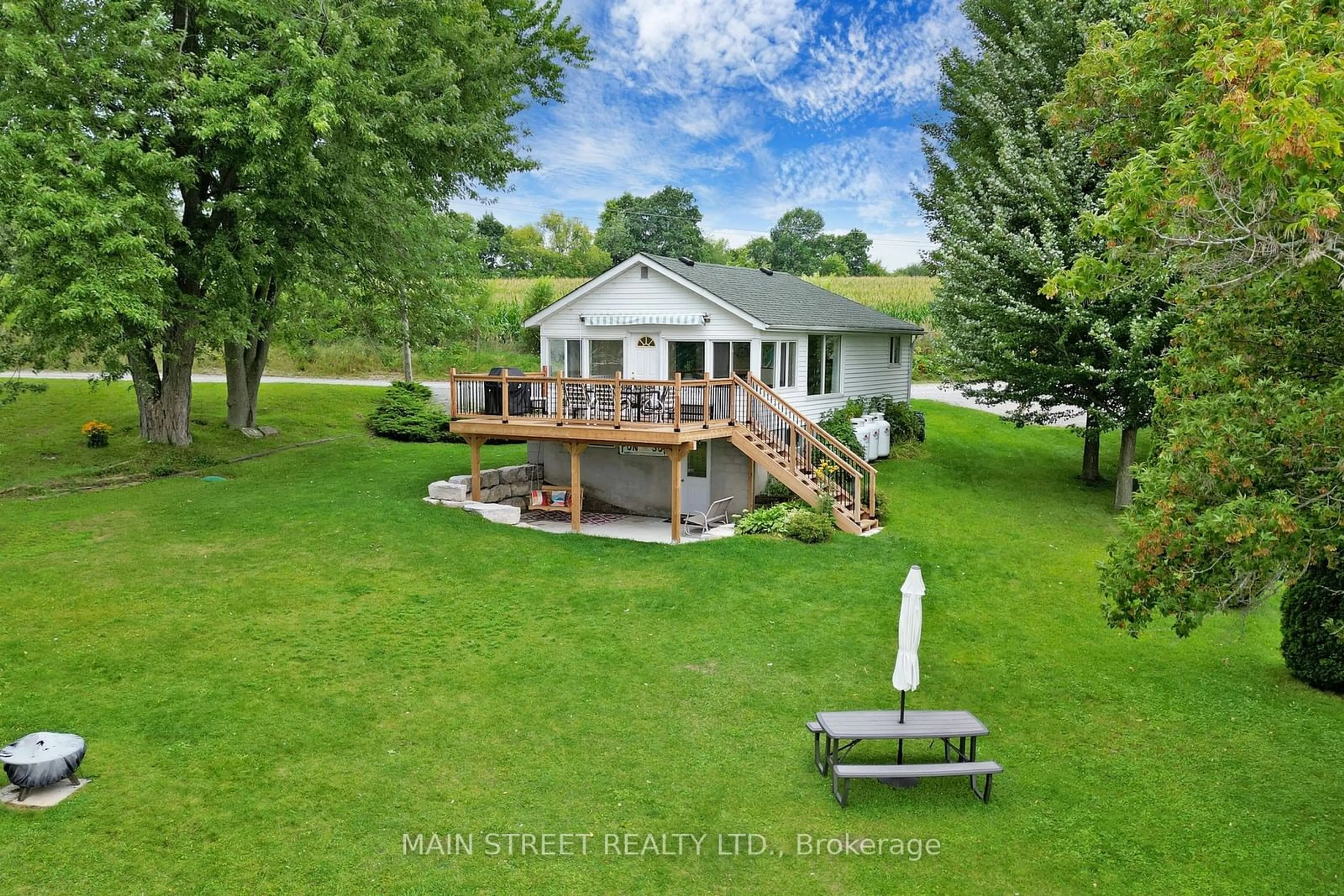 Patio, the fenced backyard for 90 Plum Point Lane, Kawartha Lakes Ontario K0M 2C0