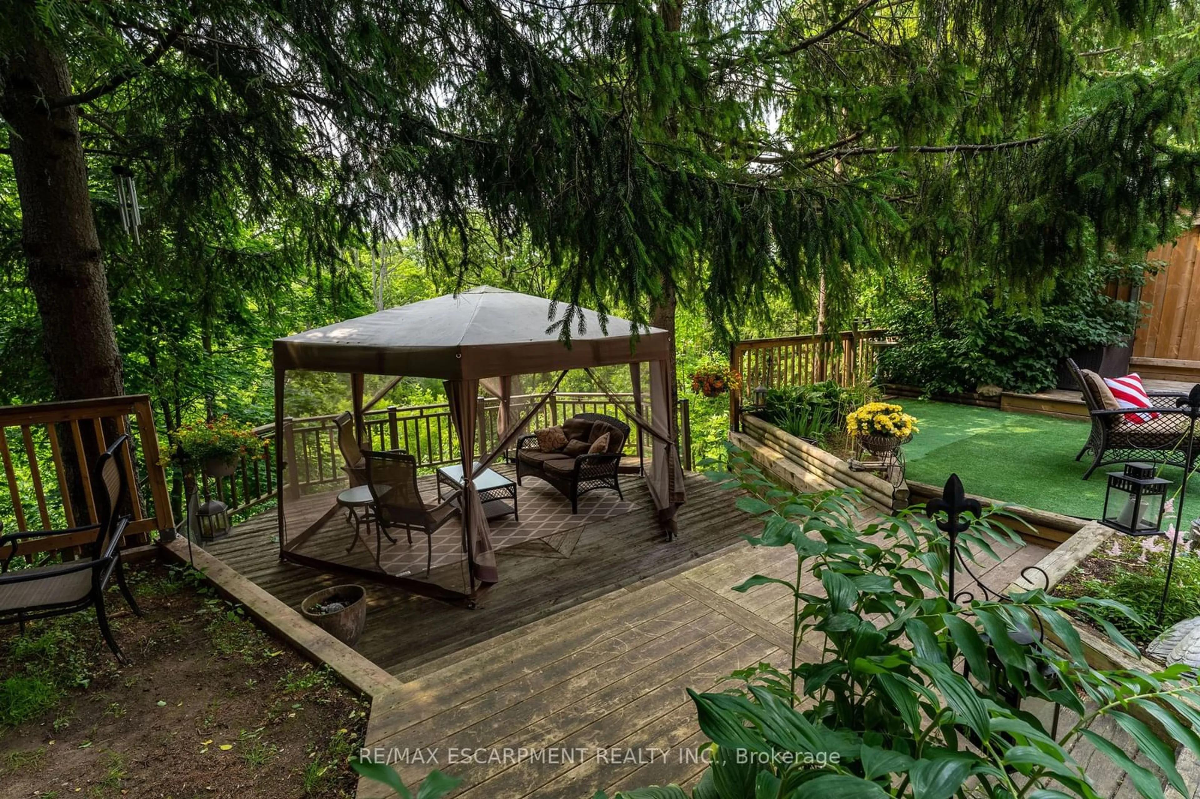 Patio, the fenced backyard for 15 Laurendale Ave, Hamilton Ontario L8B 0B3