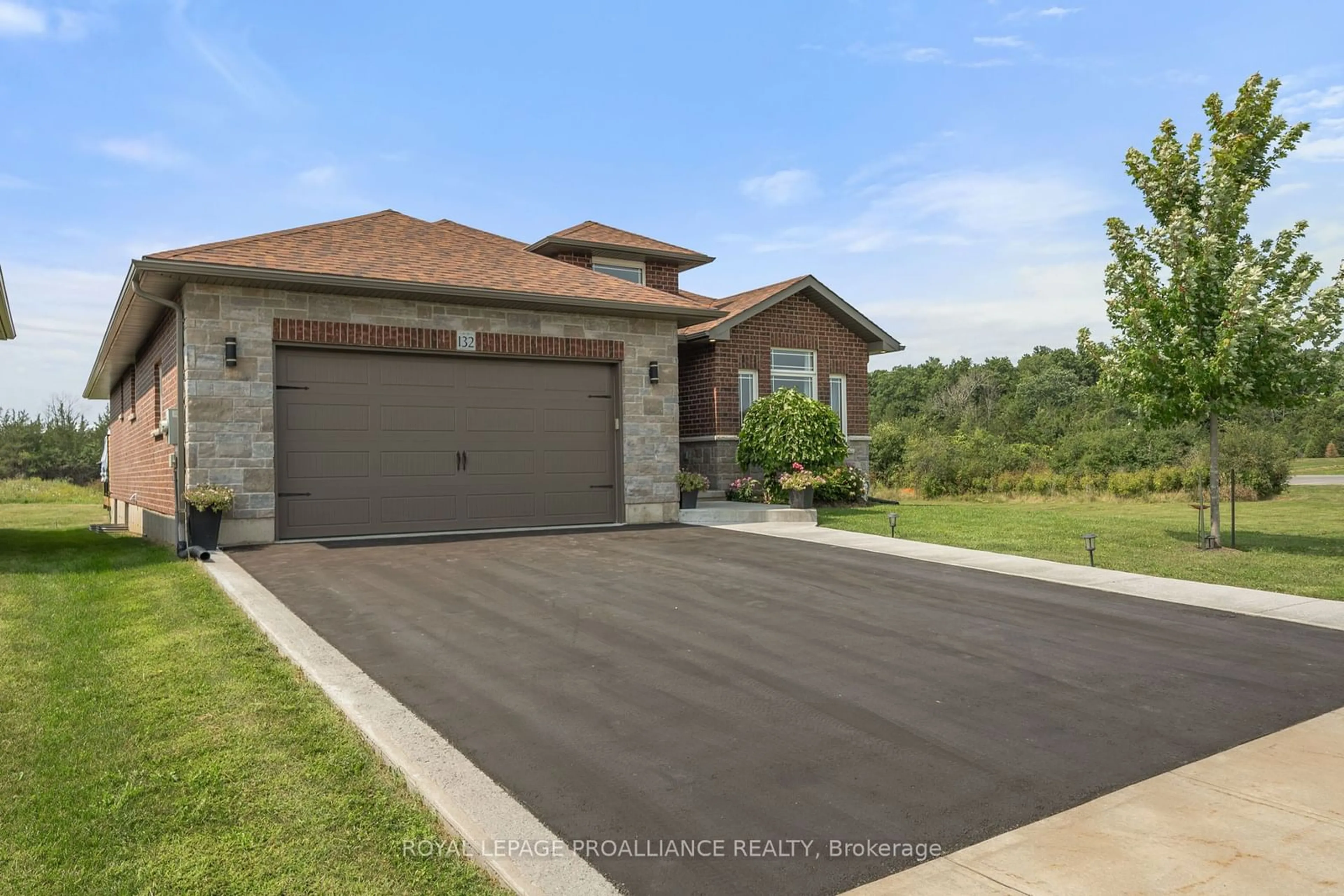 Frontside or backside of a home, the street view for 132 Cherrywood Pkwy, Greater Napanee Ontario K7R 3A1