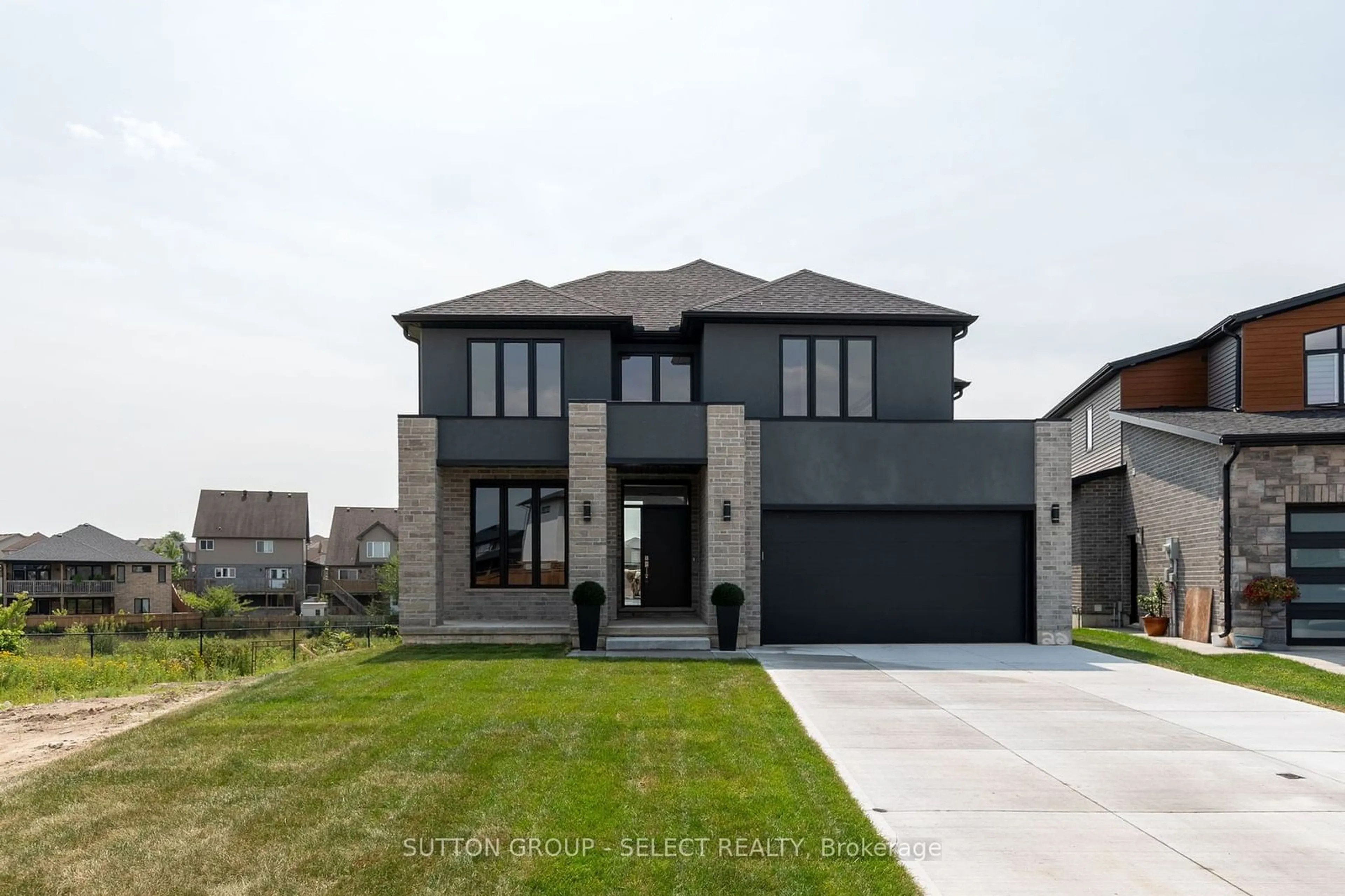 Frontside or backside of a home, the street view for 1314 Medway Park Dr, London Ontario N6G 0M7