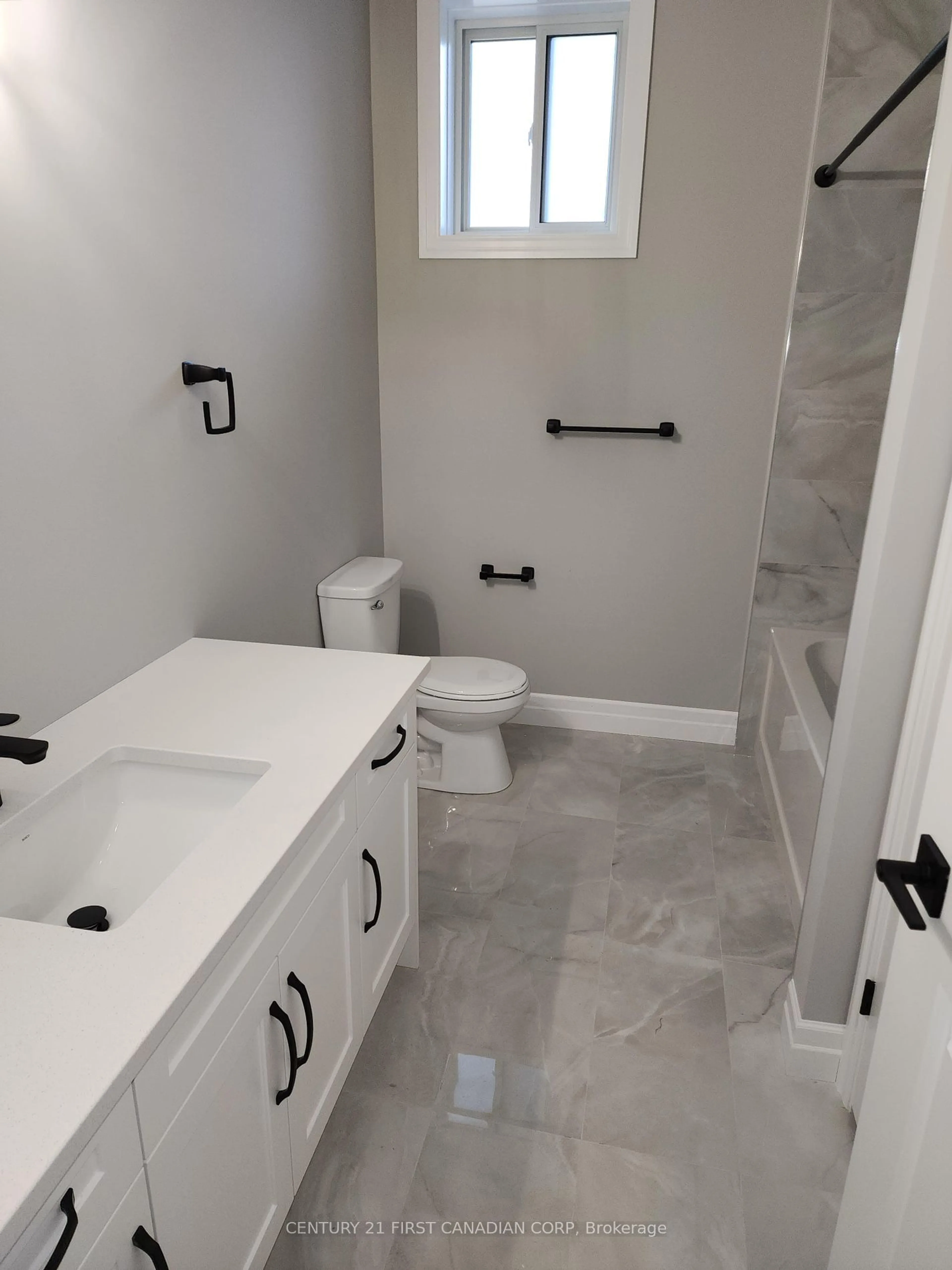 Contemporary bathroom, cement floor for 134 King St, Lambton Shores Ontario N0M 2L0