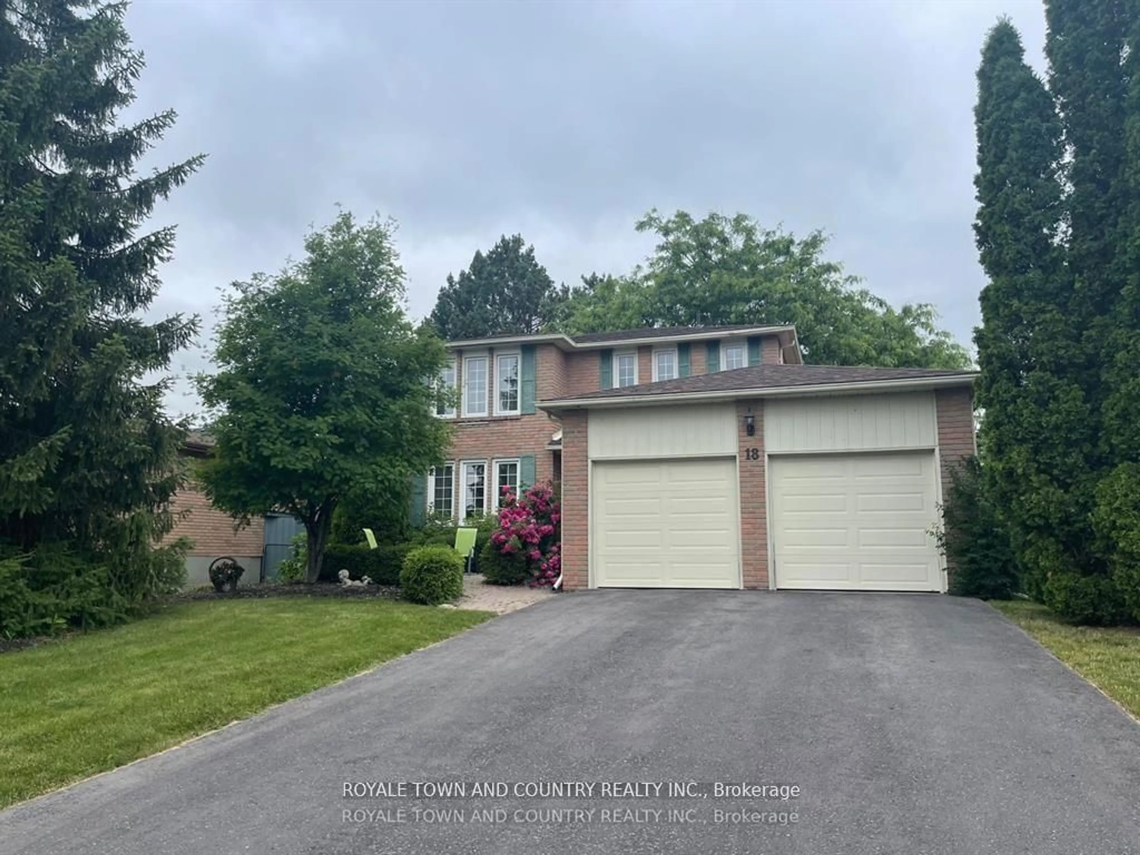 Frontside or backside of a home for 18 Corneil St, Kawartha Lakes Ontario K9V 5T4