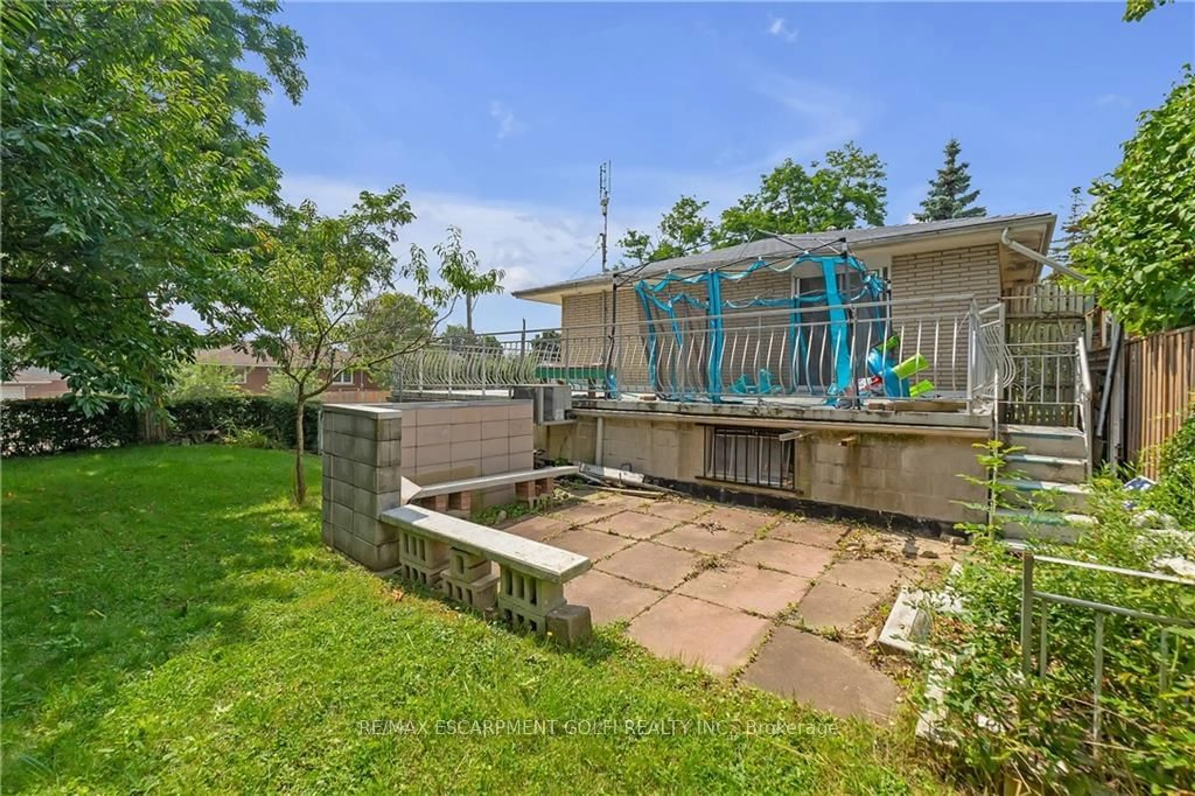 Patio, the fenced backyard for 33 SOUTH BEND Rd, Hamilton Ontario L9A 2W6