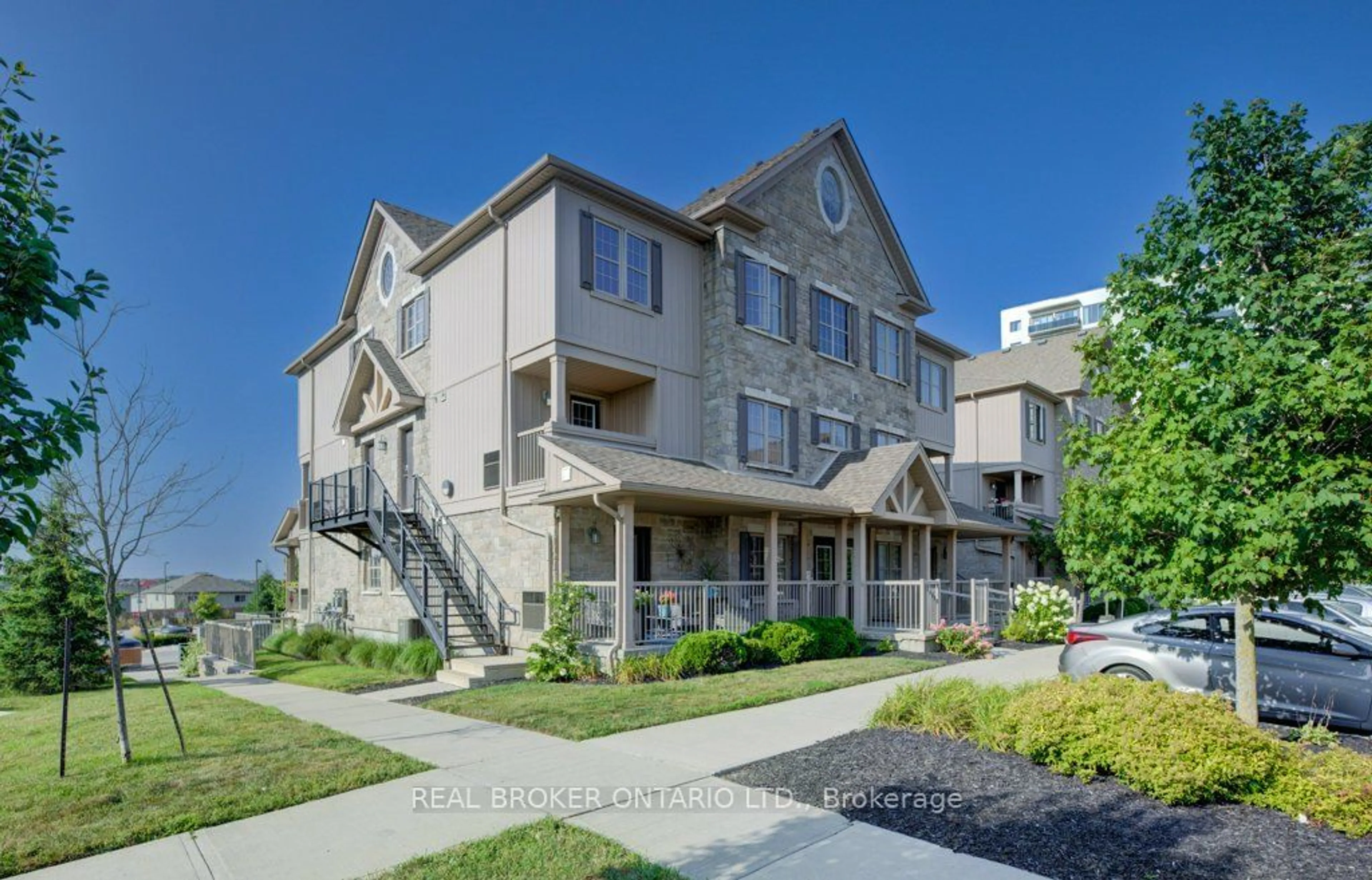 A pic from exterior of the house or condo, the street view for 1460 Highland Rd #8H, Kitchener Ontario N2N 0B7