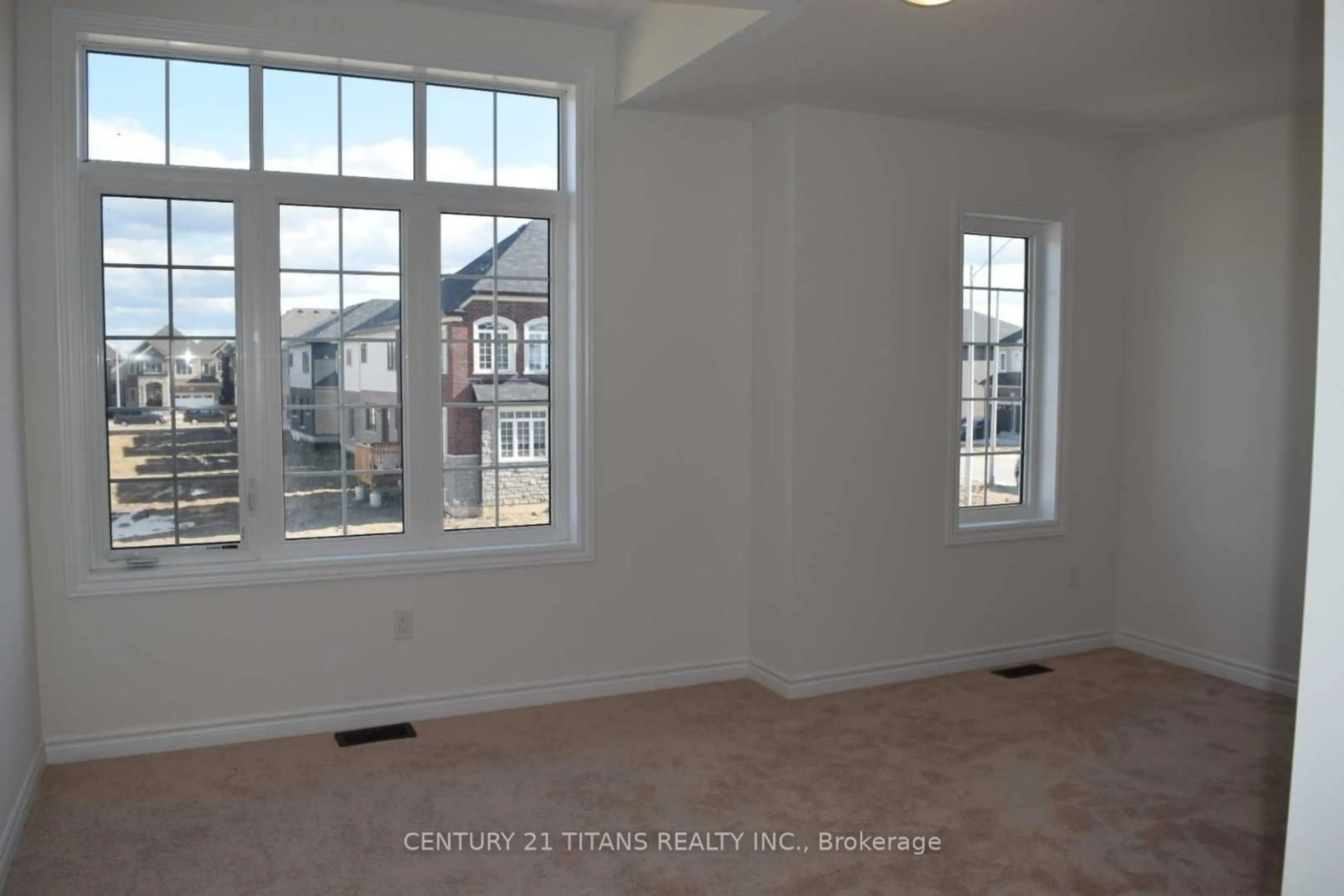 A pic of a room, wood floors for 28 Scenic Ridge Gate, Brant Ontario N3L 0K4