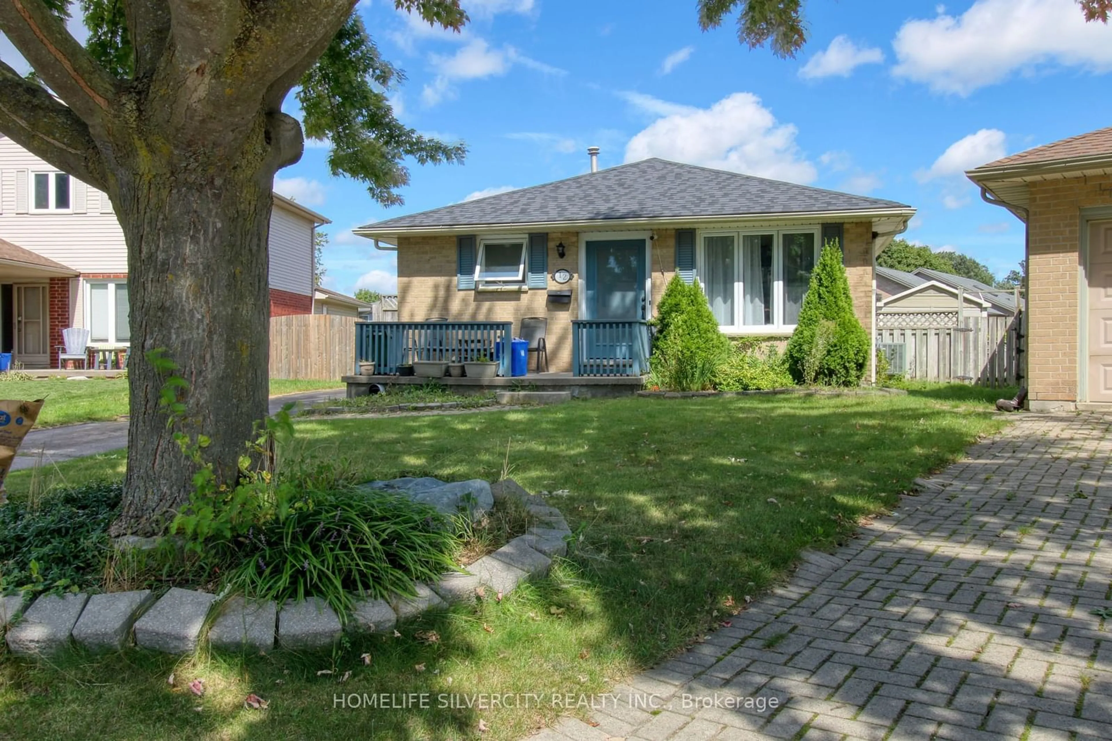 Frontside or backside of a home for 12 Portsmouth Rd, London Ontario N5V 4E3