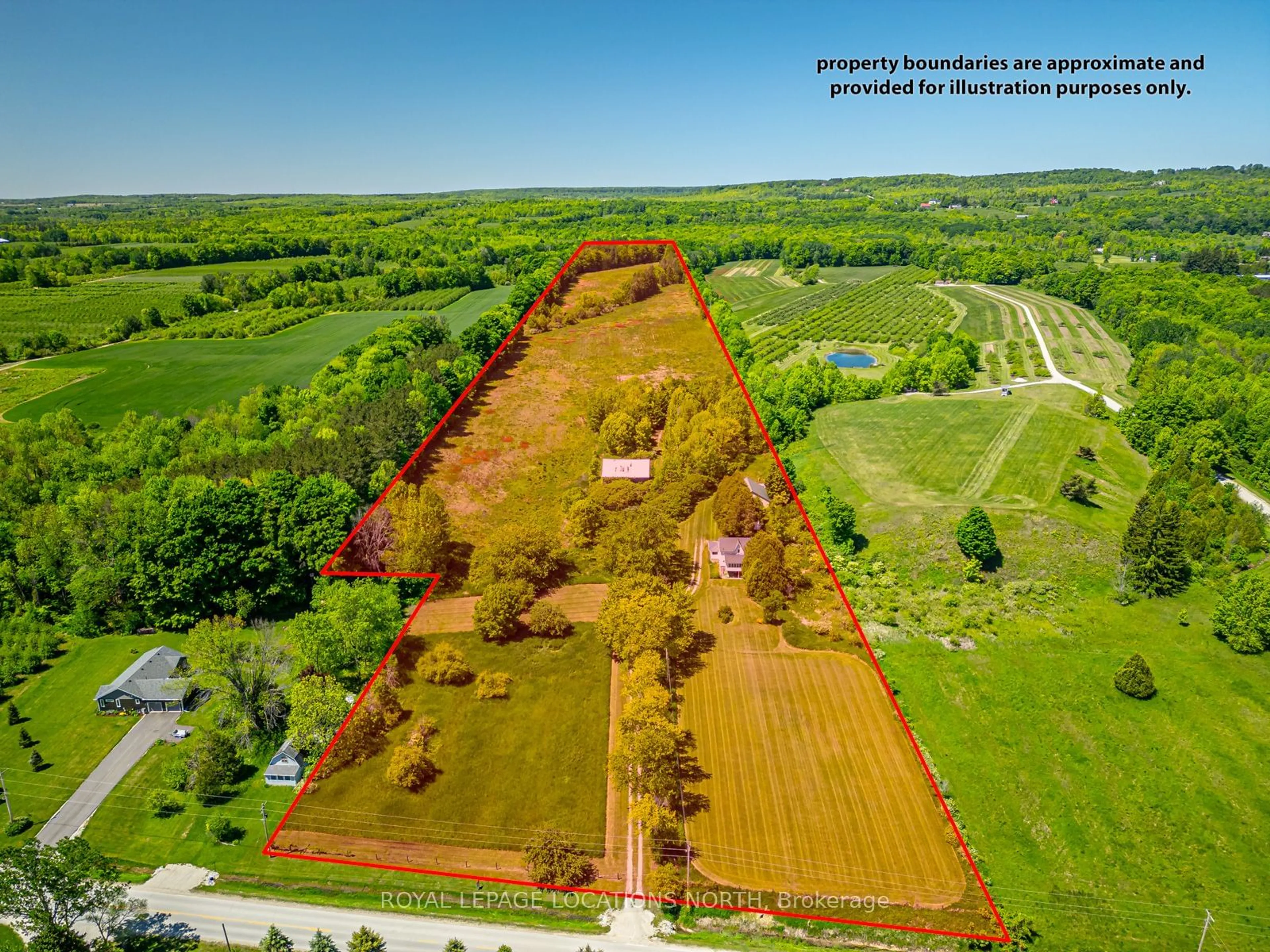 A pic from exterior of the house or condo, the fenced backyard for 158502 7th Line, Meaford Ontario N4L 1W5