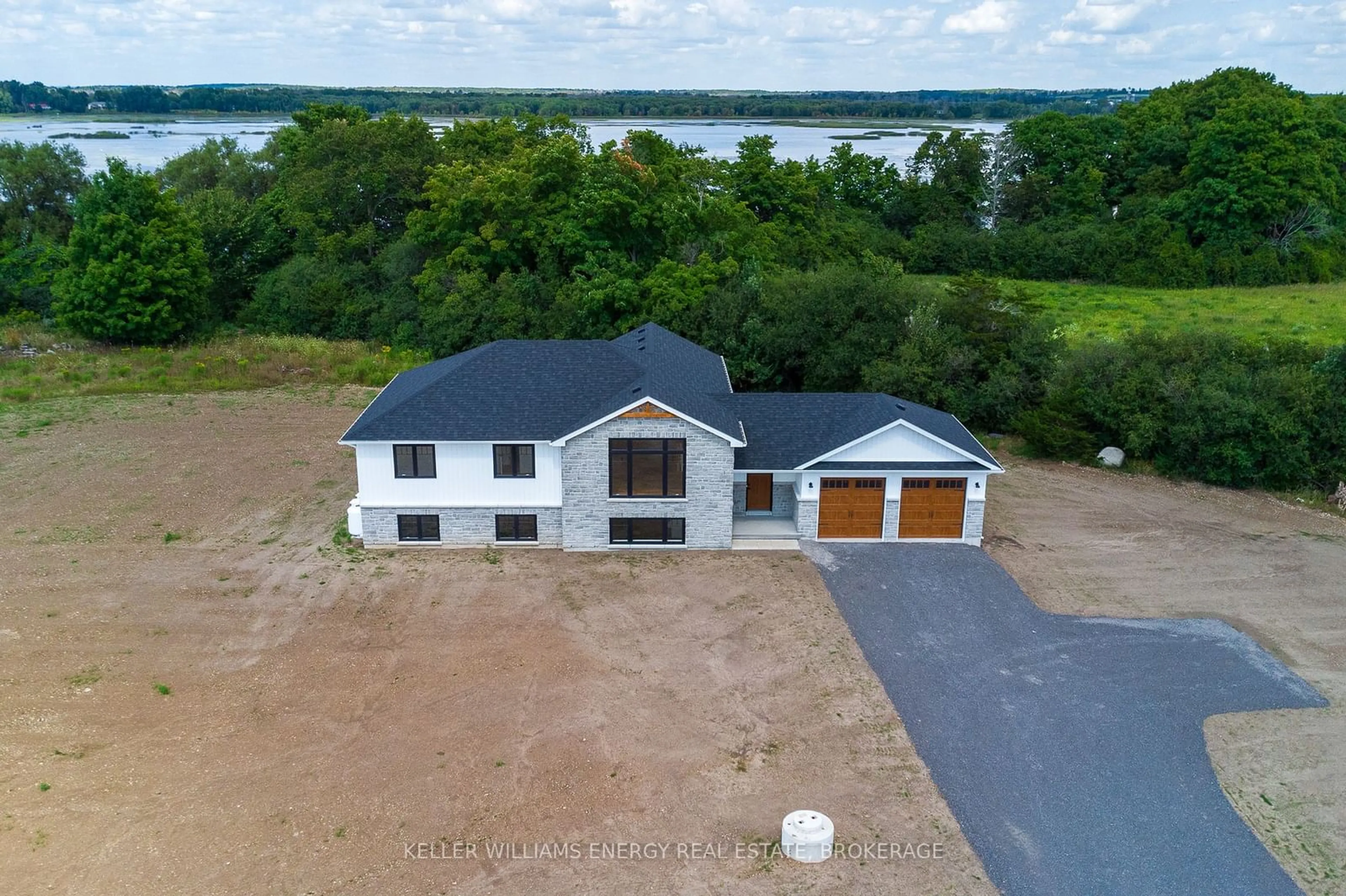 Frontside or backside of a home for 5956 County Road 1 Rd, Prince Edward County Ontario K0K 1T0