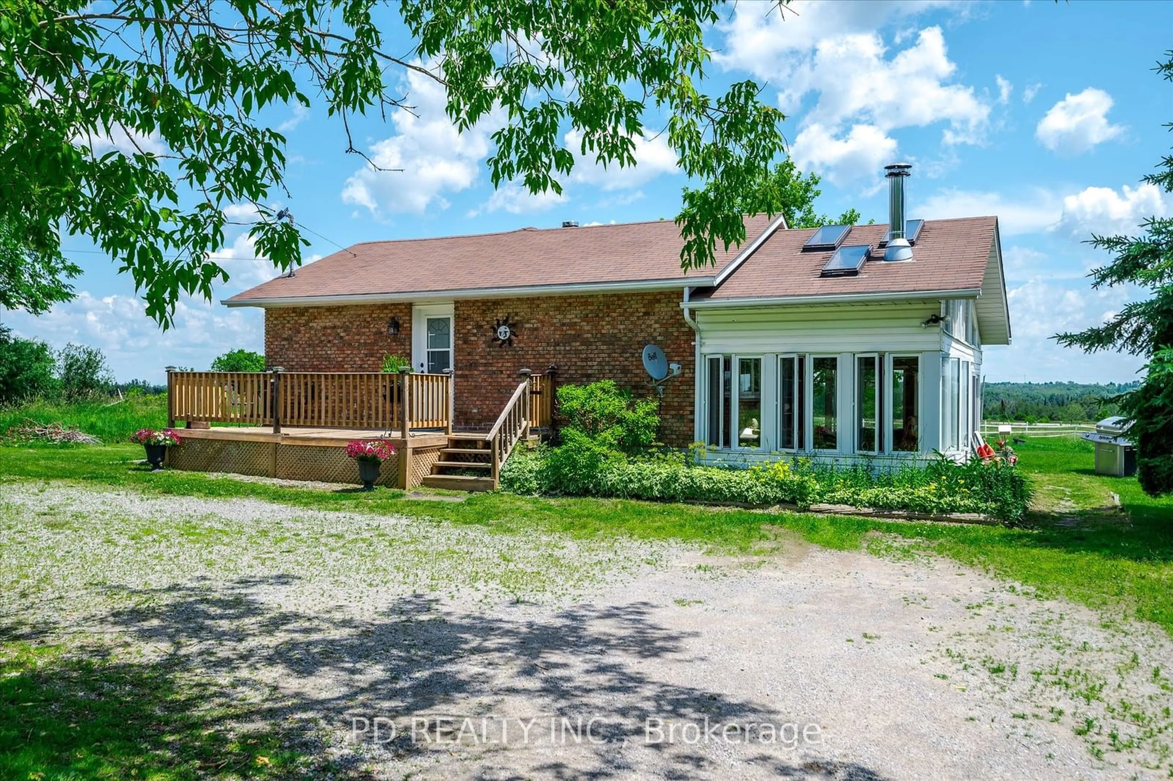 Home with brick exterior material for 506 Cedar Glen Rd, Kawartha Lakes Ontario K0M 1L0