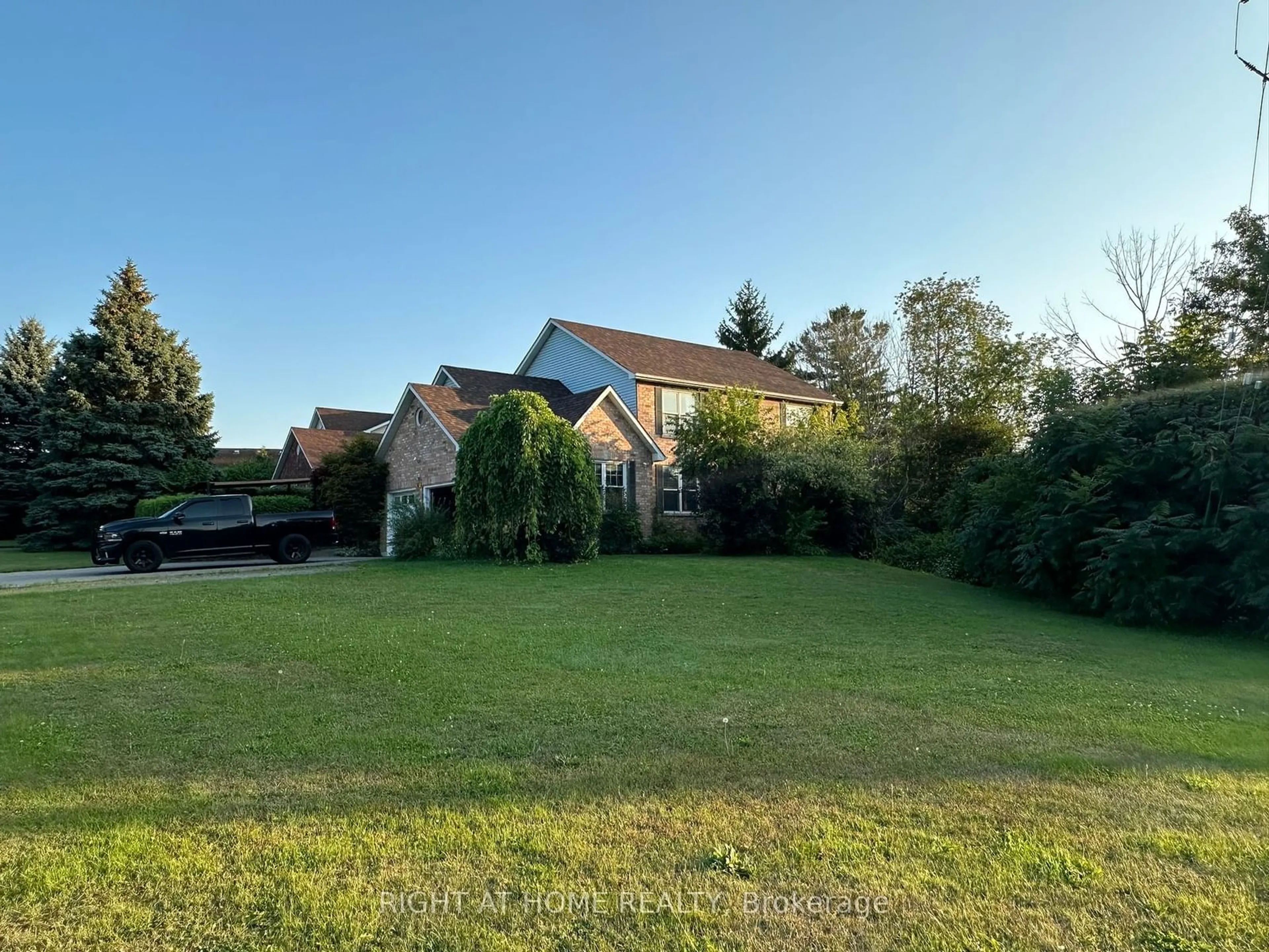 Frontside or backside of a home, the fenced backyard for 41 Ravine Dr, Port Hope Ontario L1A 4G7