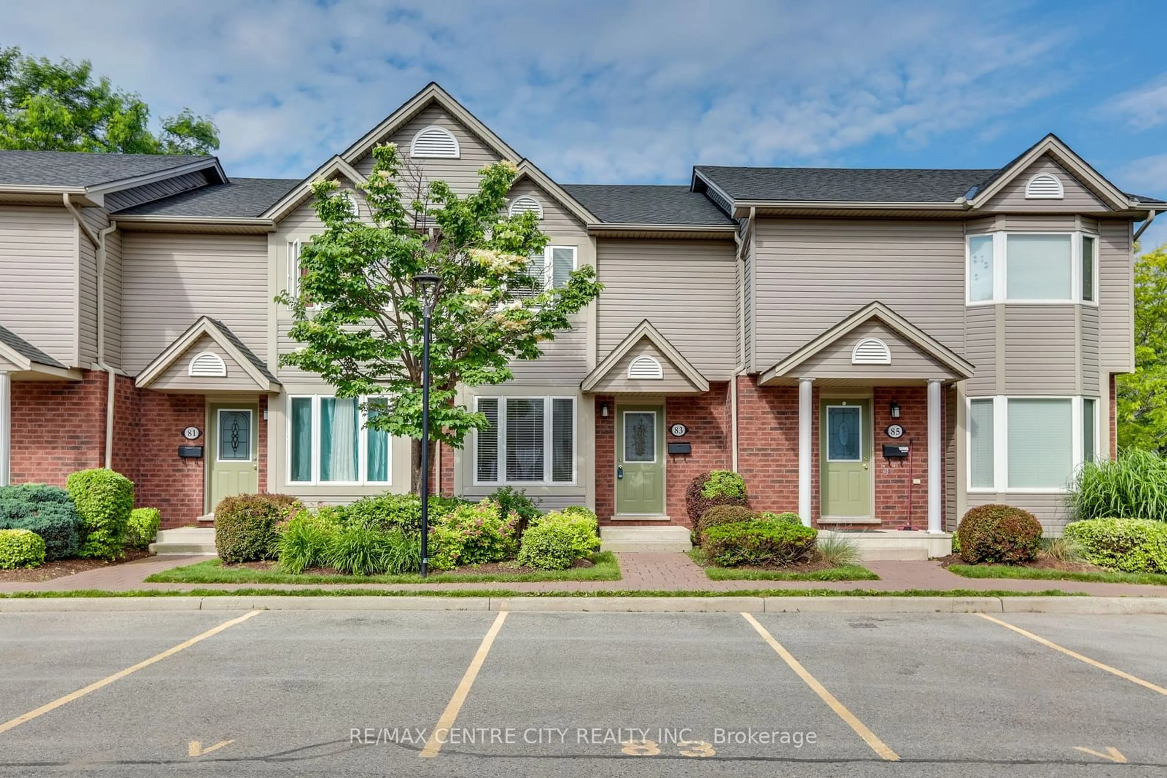 A pic from exterior of the house or condo, the street view for 1535 Trossacks Ave #83, London Ontario N5X 4R1