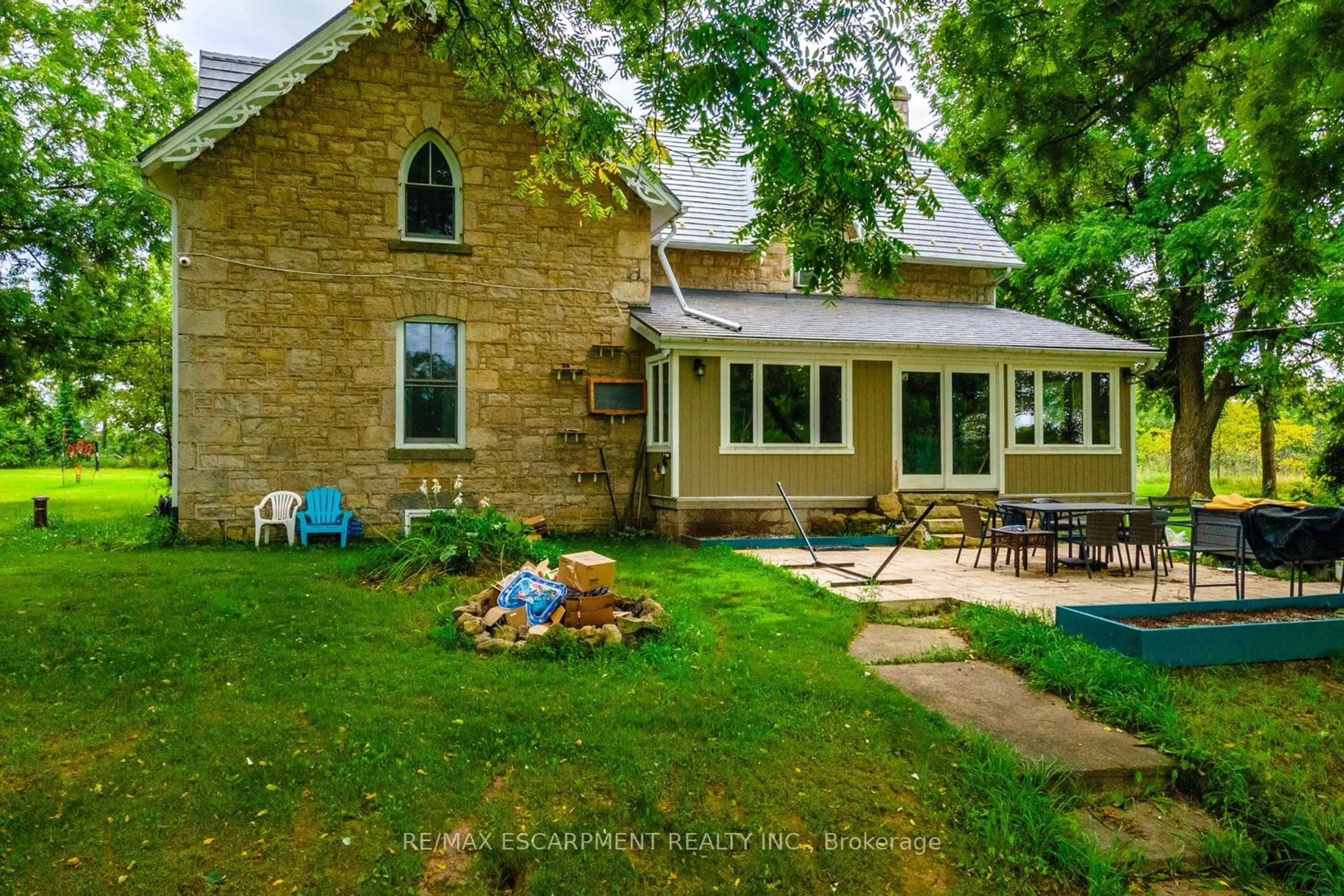 Frontside or backside of a home, the fenced backyard for 1172 Concession 8 Rd, Hamilton Ontario N0B 2J0