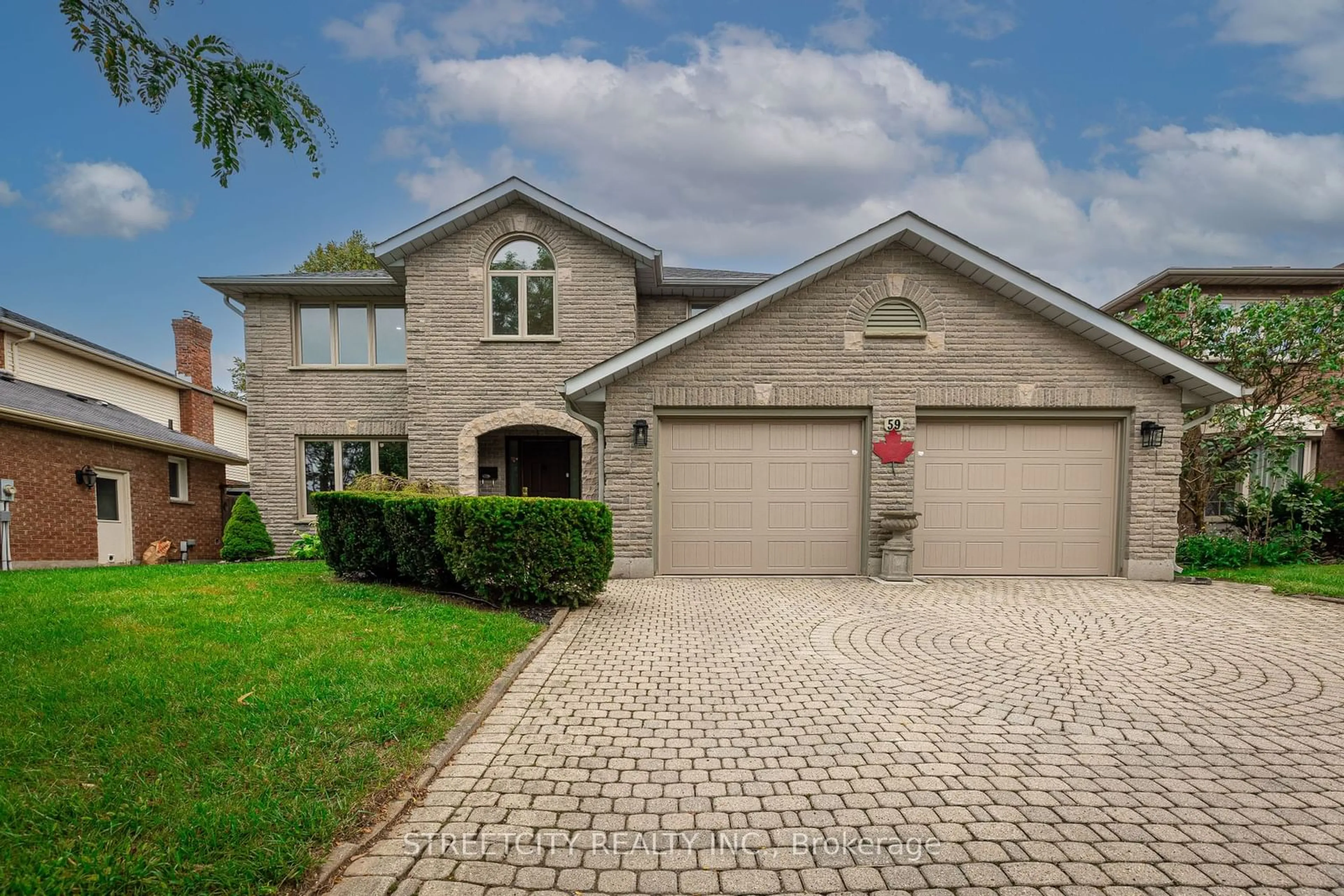 Frontside or backside of a home, the street view for 59 Sunnyside Dr, London Ontario N5X 3M4