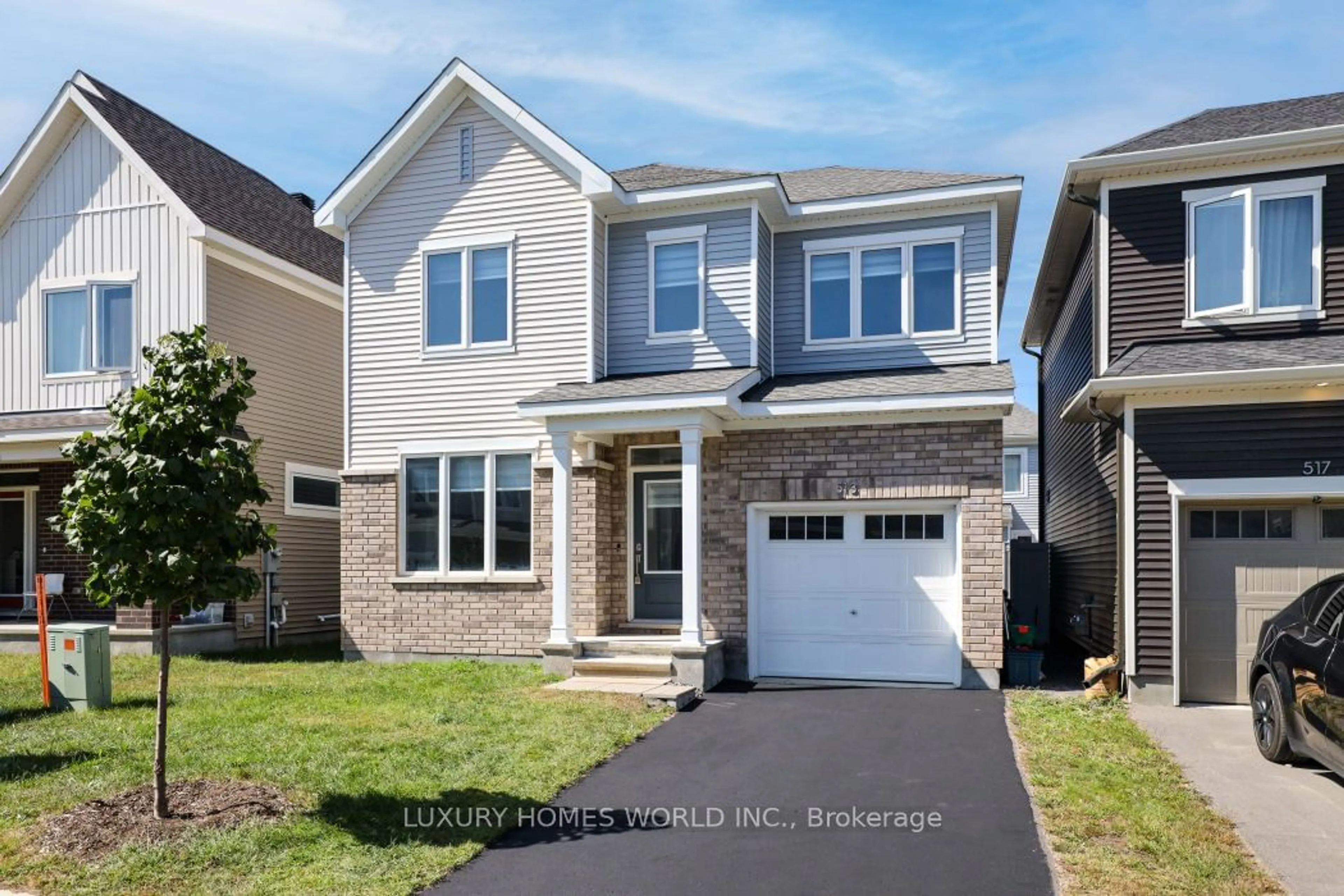 Frontside or backside of a home, the street view for 513 Sturnidae St, Barrhaven Ontario K2J 6W9