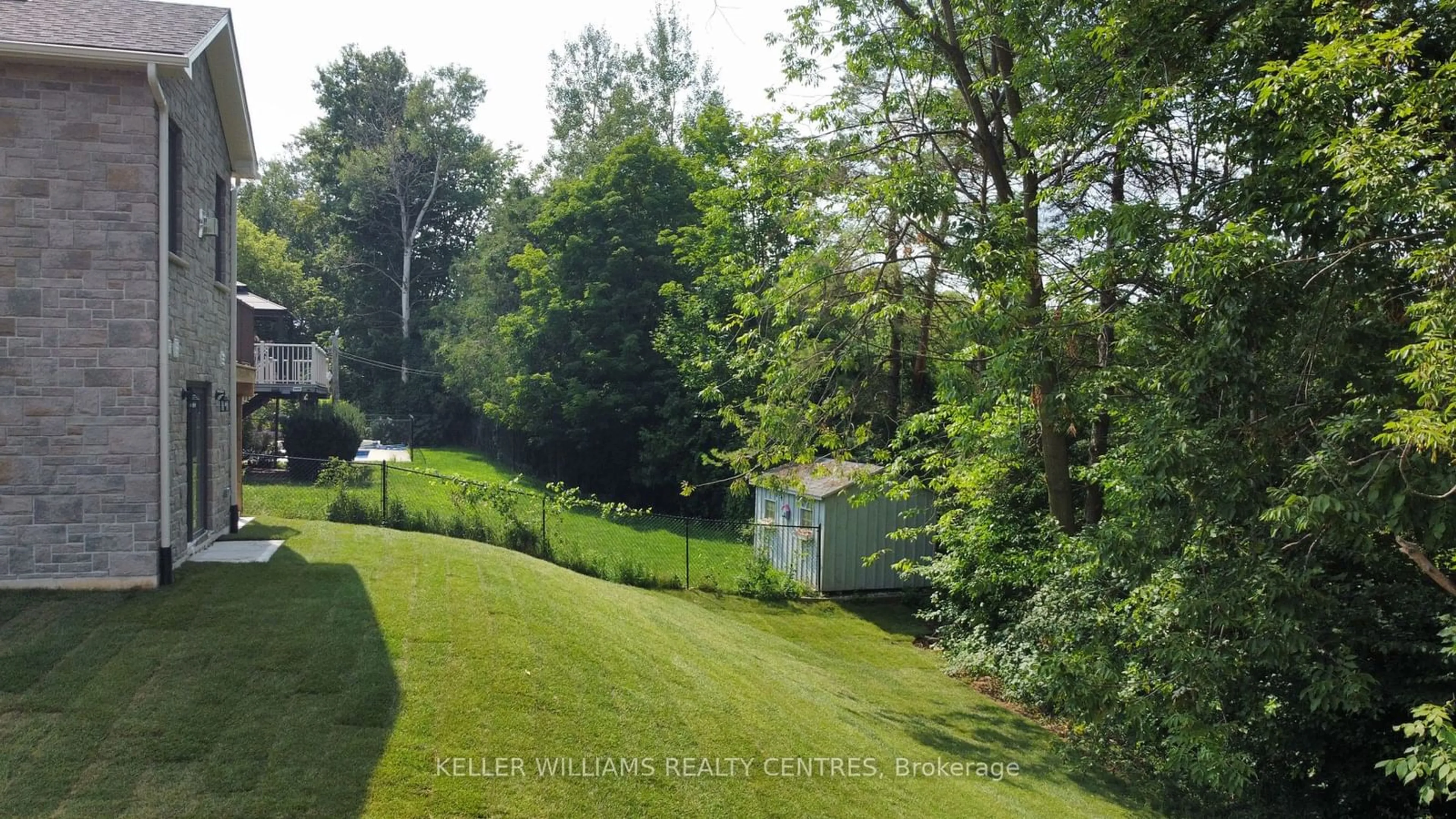 A pic from exterior of the house or condo, the fenced backyard for 694 17th Street Cres, Hanover Ontario N4N 3M3