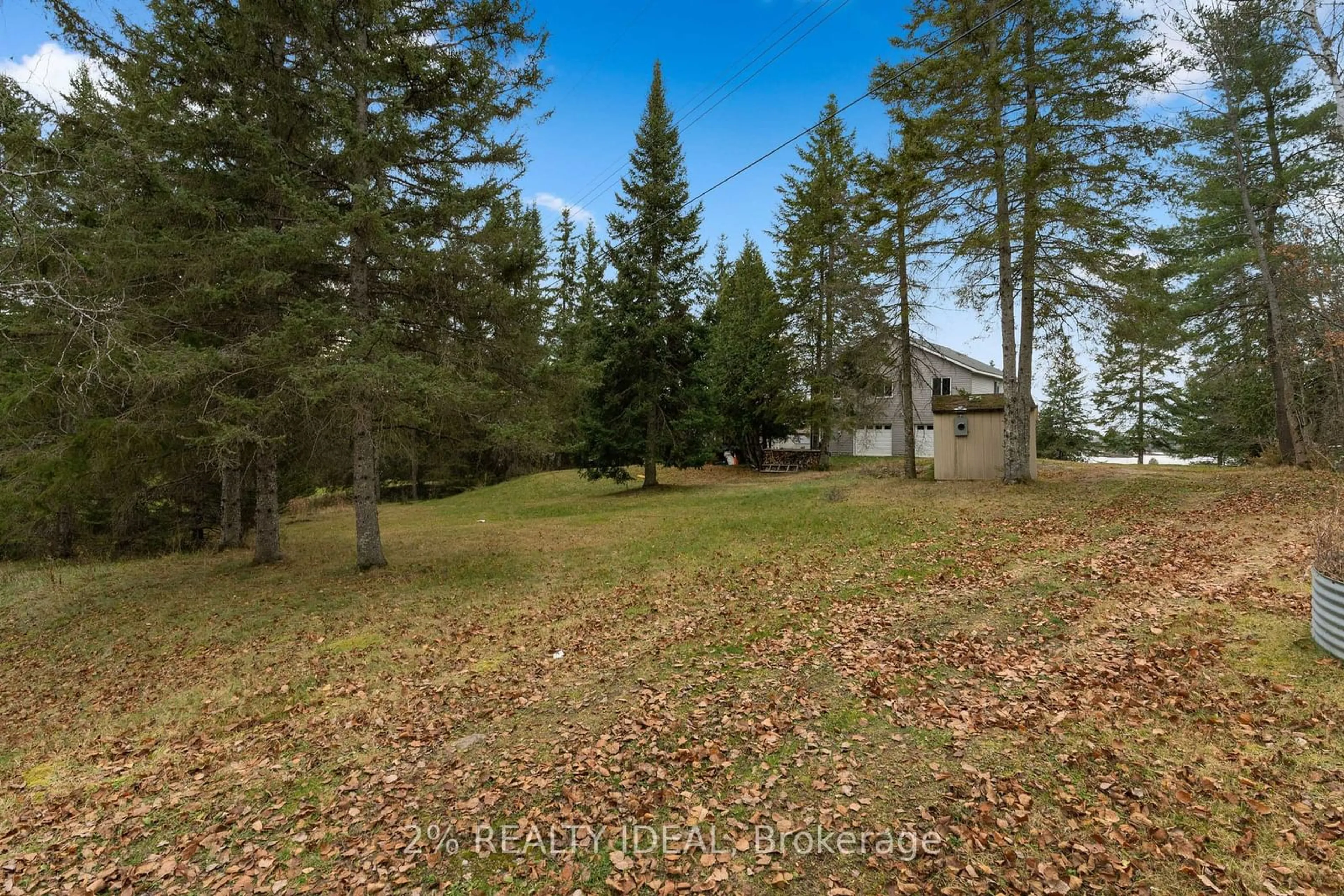 A pic from exterior of the house or condo, the fenced backyard for 11 Nickles Cove Rd, Whitestone Ontario P0A 1G0