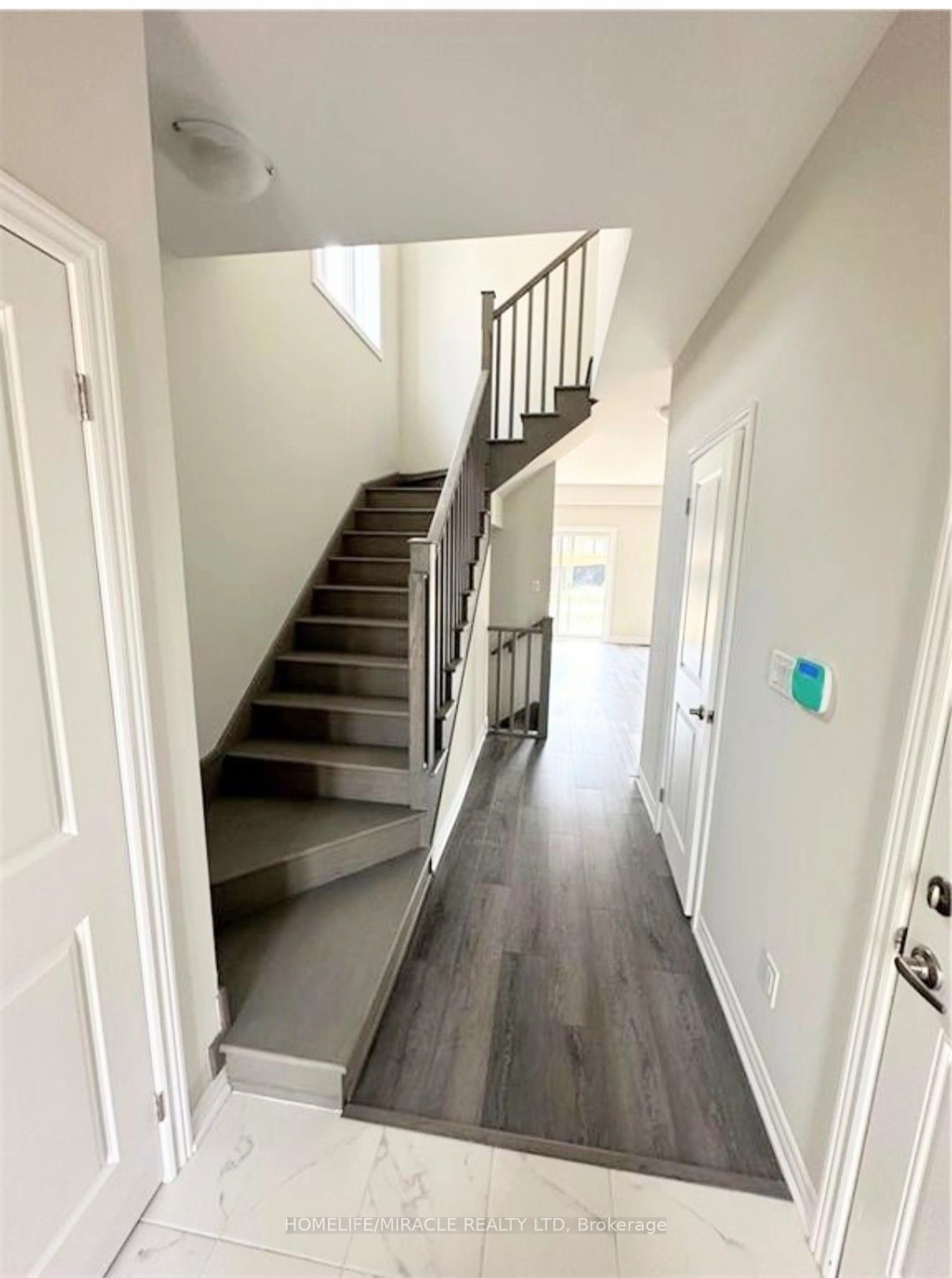 Indoor foyer for 63 Genoa Dr, Hamilton Ontario L9B 0J9