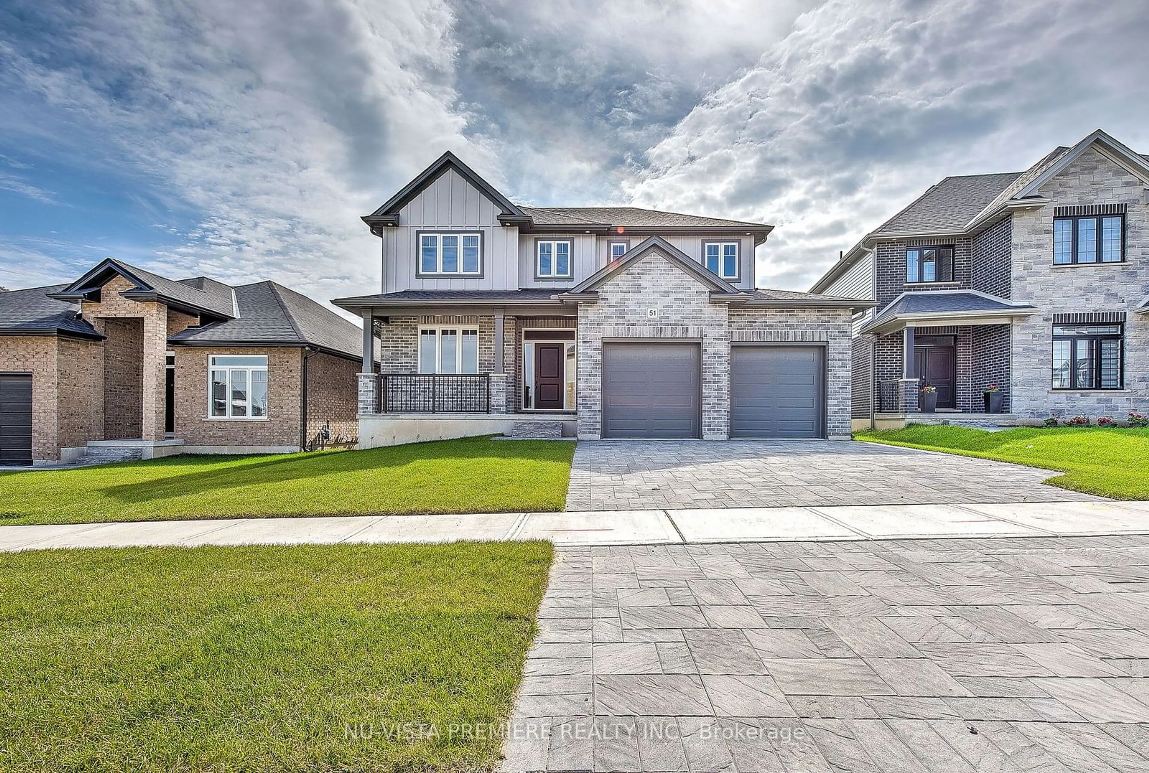 Frontside or backside of a home, the street view for 51 Basil Cres, Middlesex Centre Ontario N0M 2A0