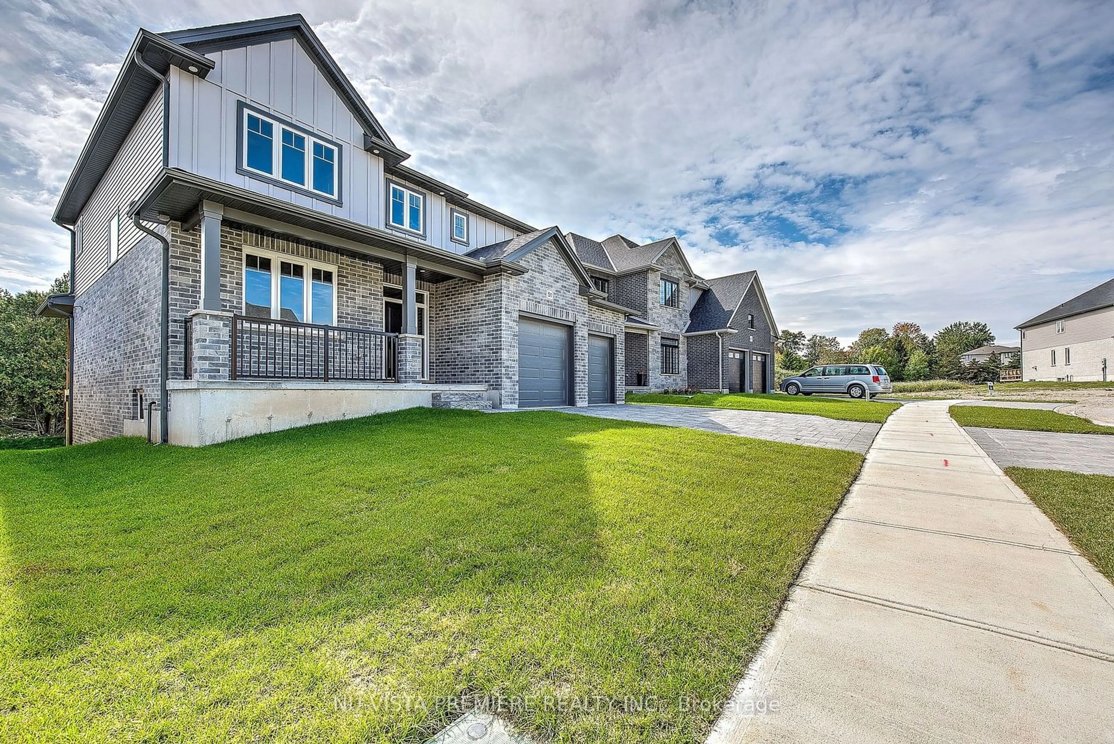 Frontside or backside of a home, the street view for 51 Basil Cres, Middlesex Centre Ontario N0M 2A0