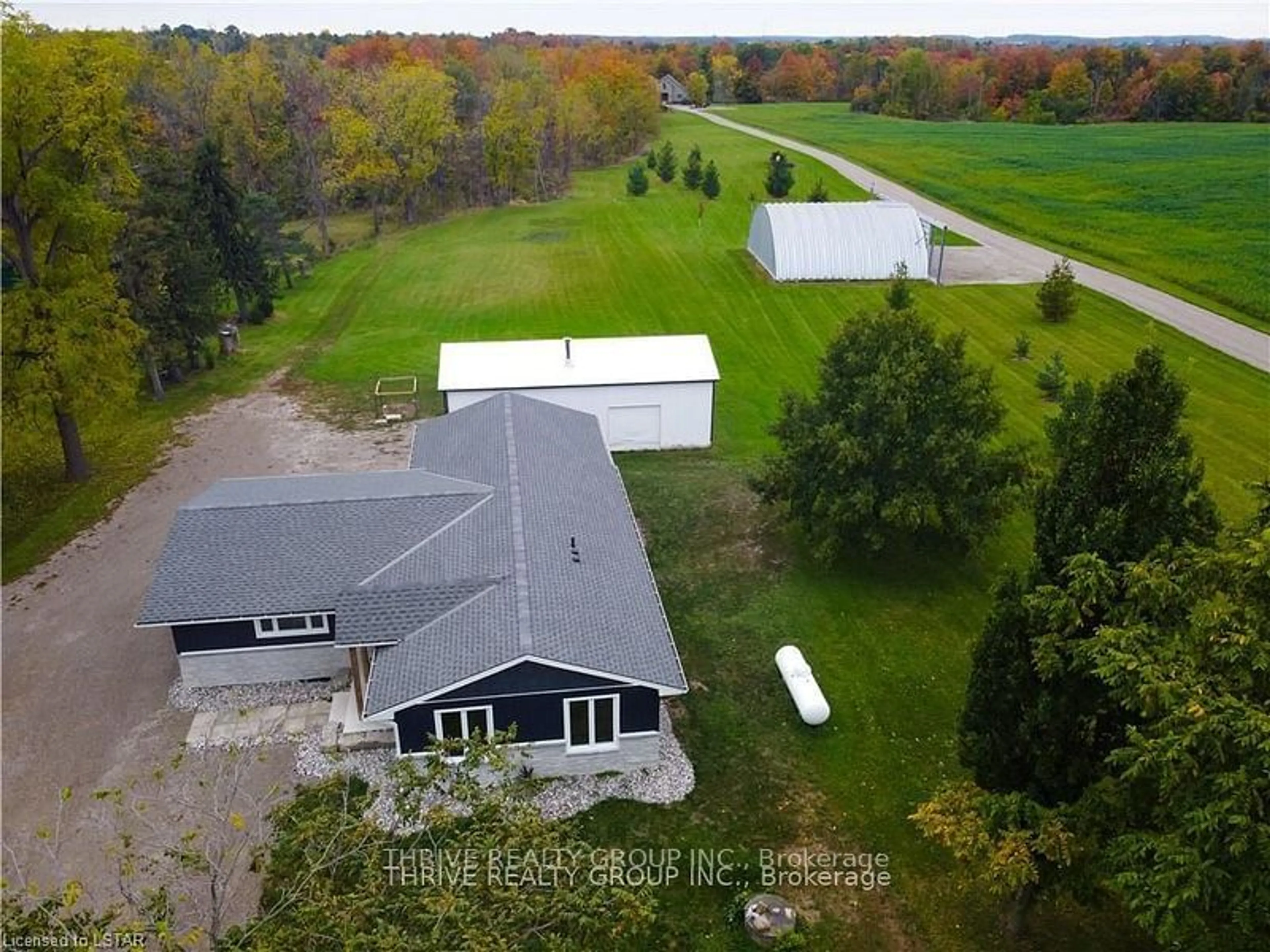 Frontside or backside of a home, the front or back of building for 1559 ELMTREE Dr, North Middlesex Ontario N0M 2K0