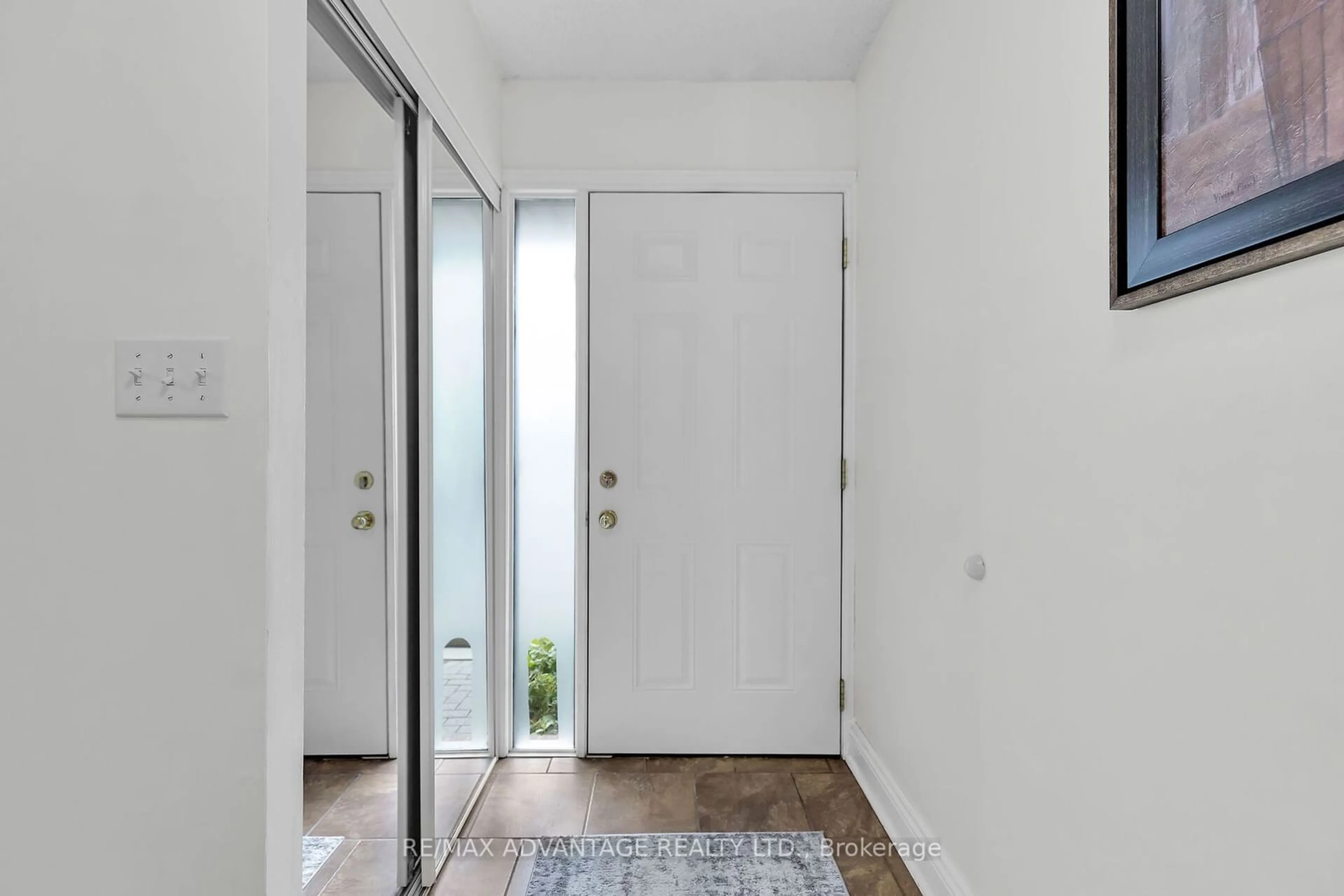 Indoor entryway, wood floors for 215 Commissioners Rd #5, London Ontario N6J 1X9