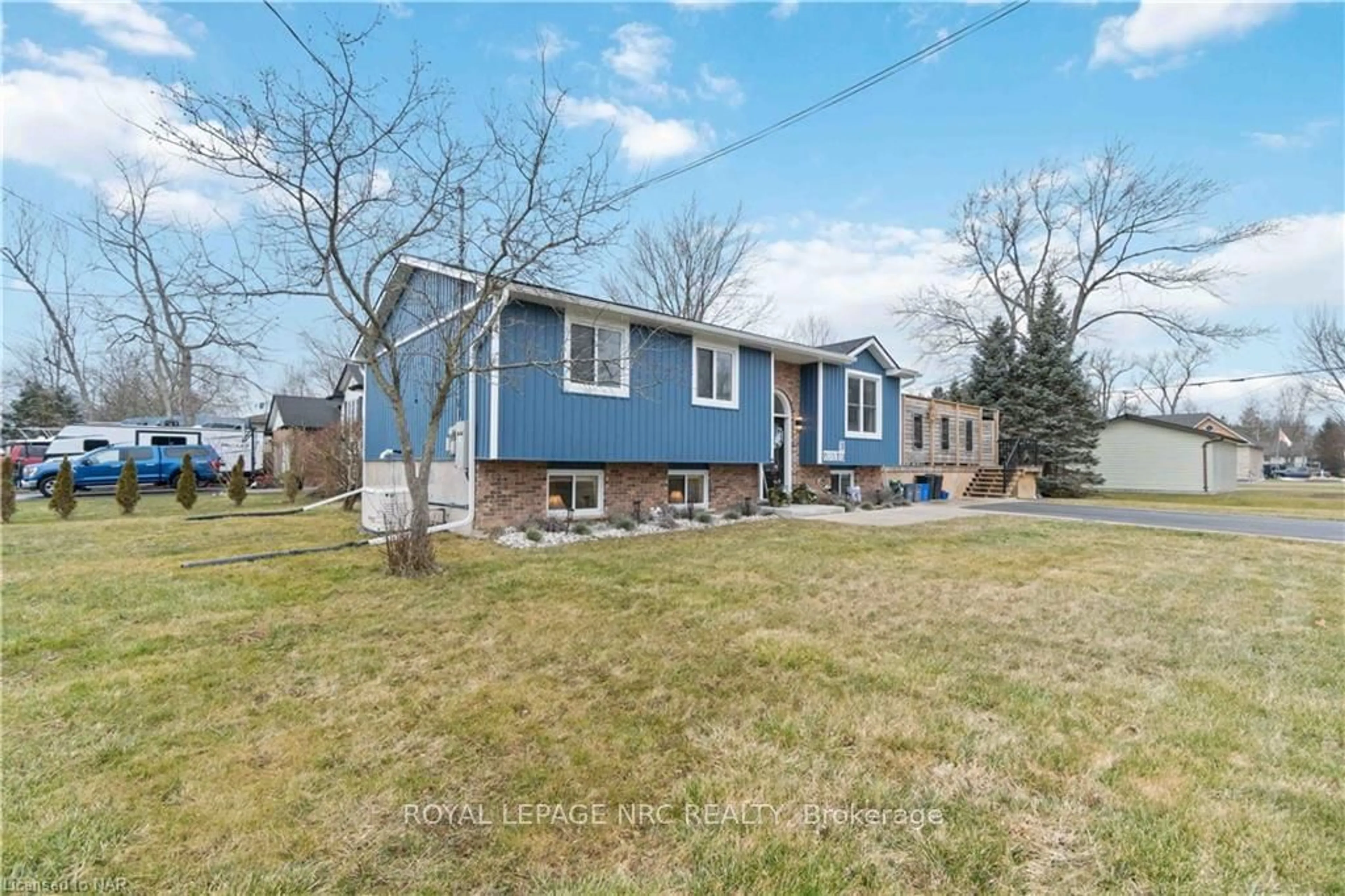 Frontside or backside of a home, the fenced backyard for 83 Gordon Ave, Fort Erie Ontario L0S 1N0