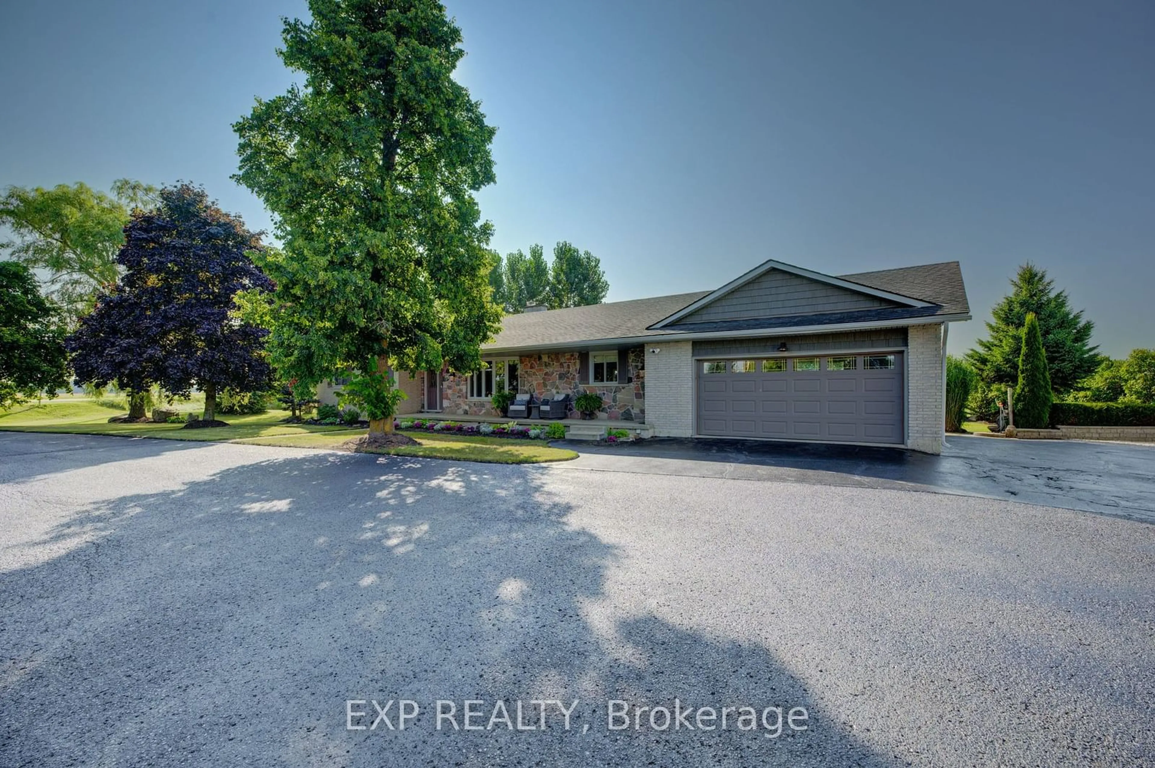 A pic from outside/outdoor area/front of a property/back of a property/a pic from drone, street for 7998 Wellington Rd 7, Mapleton Ontario N0G 2K0