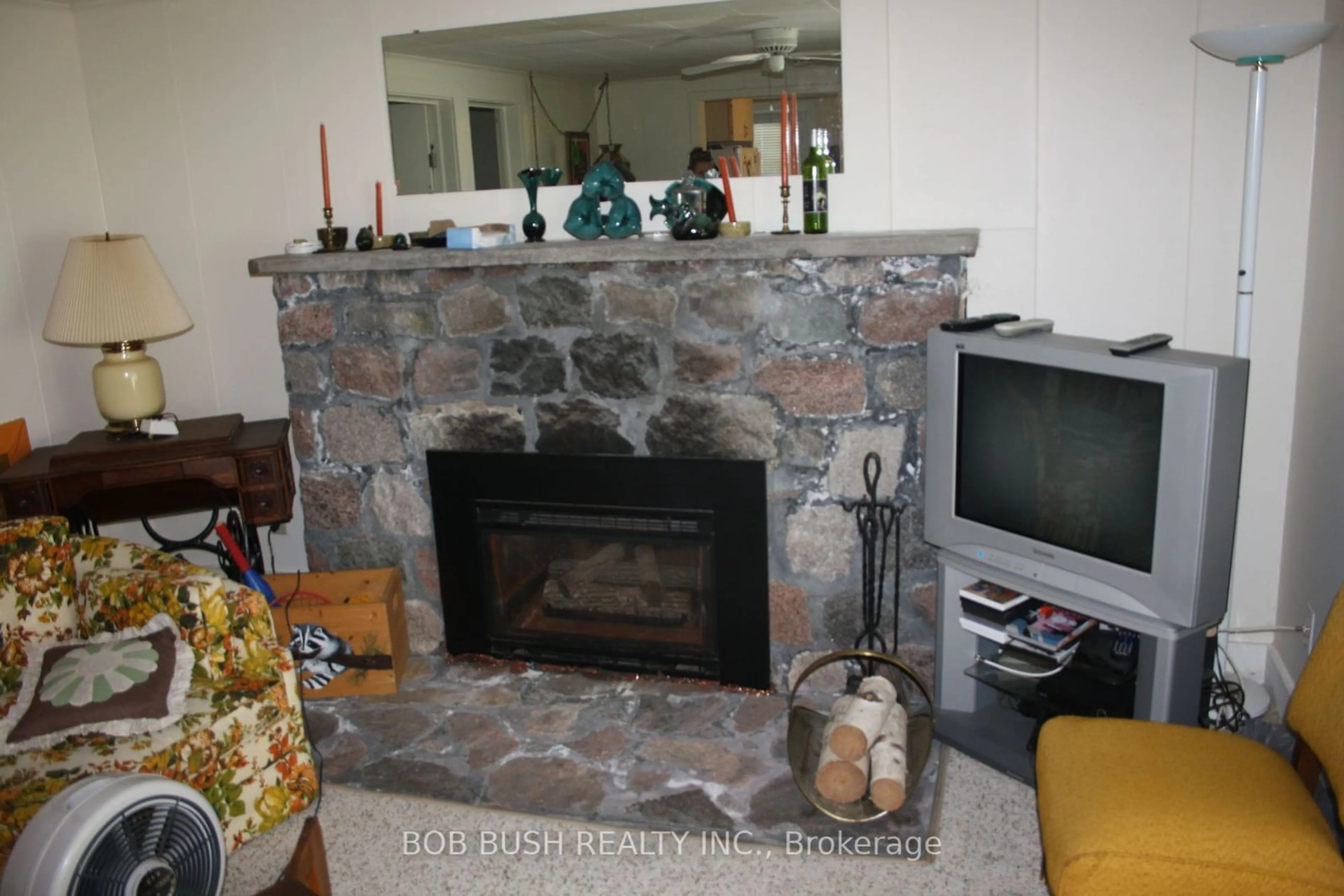 Living room, cement floor for 174A Landsdowne St, Callander Ontario P0H 1H0