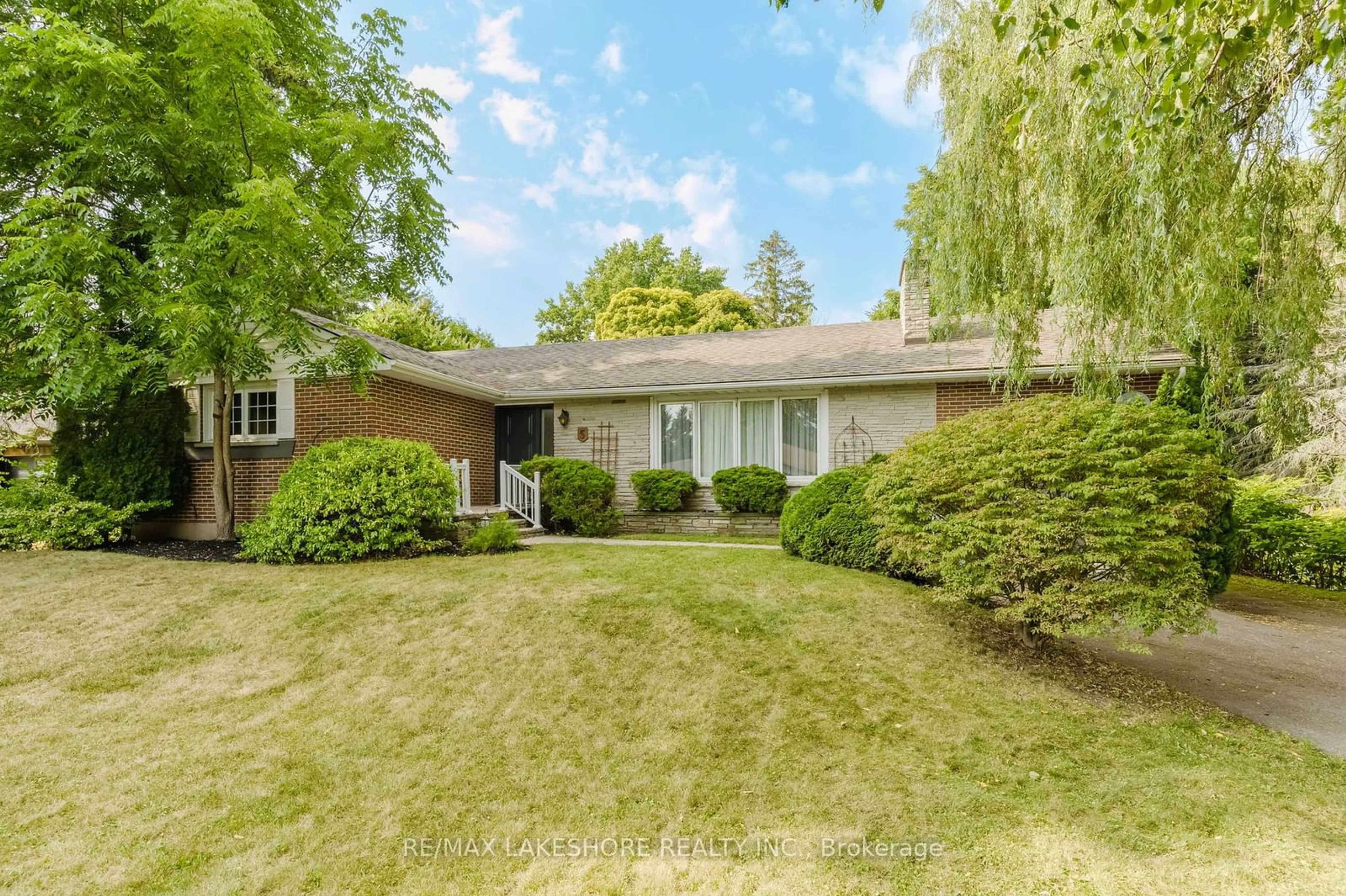 Frontside or backside of a home, the fenced backyard for 5 Acadia Dr, Cobourg Ontario K9A 1T8