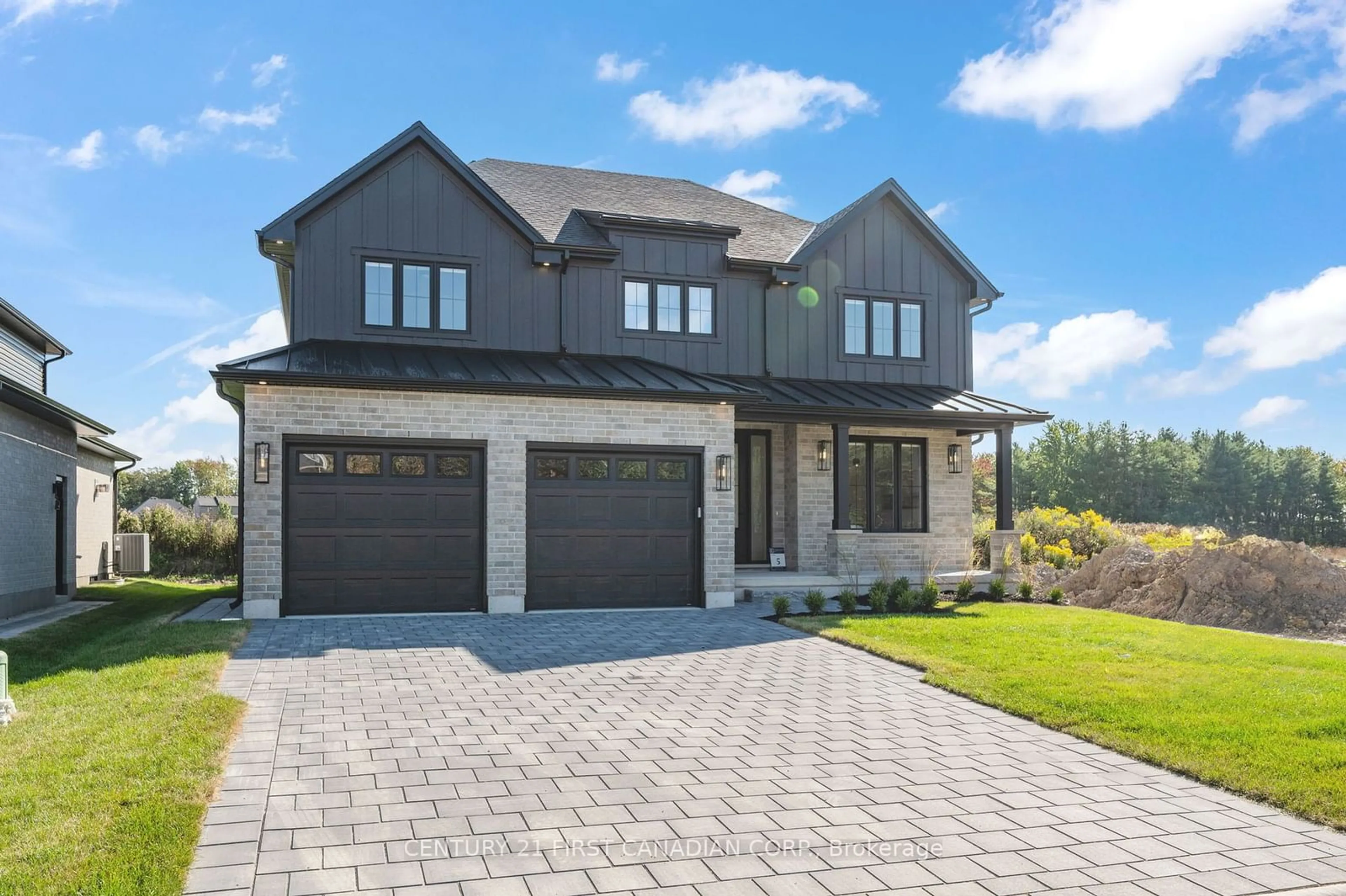 Home with brick exterior material for 122 Timberwalk Tr, Middlesex Centre Ontario N0M 2A0